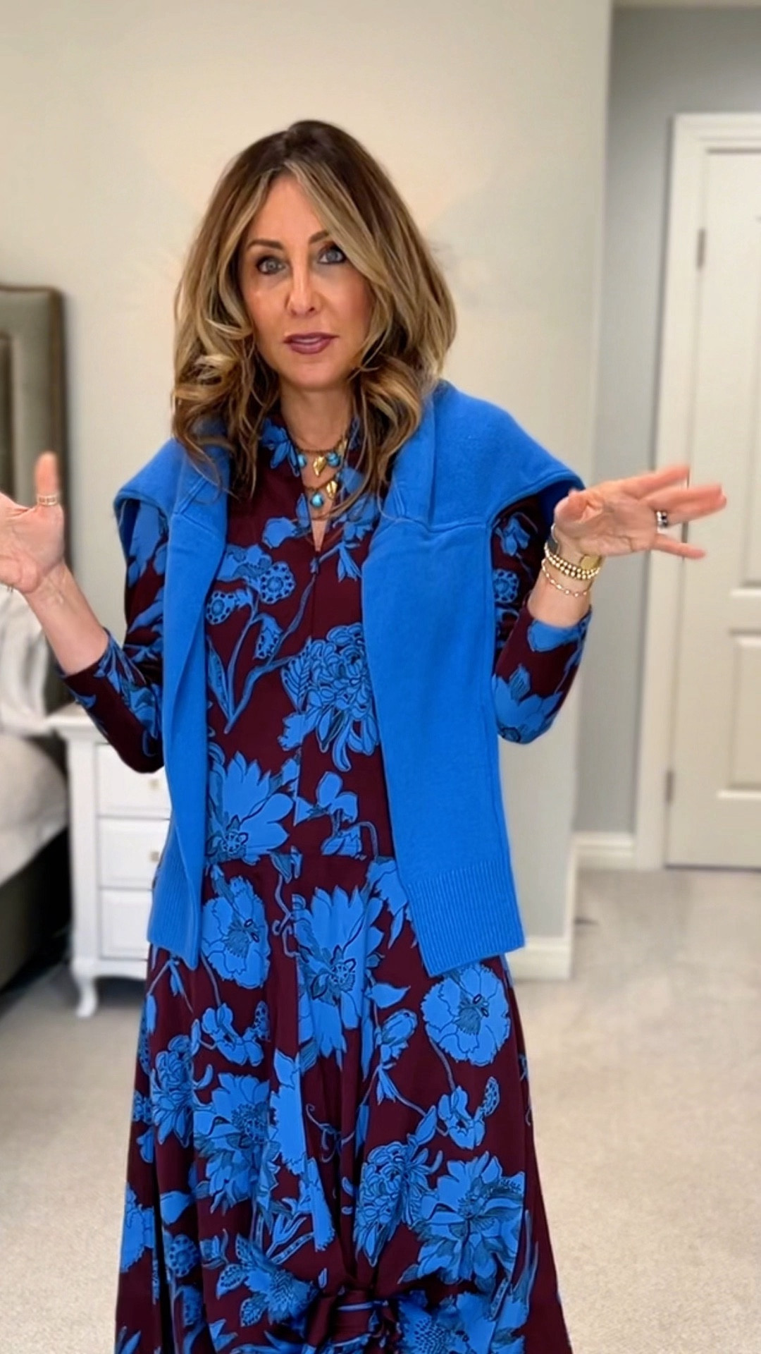 Have I mentioned that I am obsessed with the British fashion brand ME+EM? I mean how fabulous is this floral outfit? ME+EM is the epitome of quiet luxury, where the goal is to create interest and depth in the outfit, but in a way that is held back and restrained.

This sweater and dress combo embraces color but in a controlled way. Using only two colors, in deeper tones, gives this print excitement. And staying away from the expected dark color of black and opting for a deep plum/cabernet, also ups the ante. Here are some of my go-to ways to tie a sweater!

#SponsoredPost but, as always, I only rep brands I love and wear. @me_andem #TBC #MEandEM 

#LTKstyletip #LTKover40