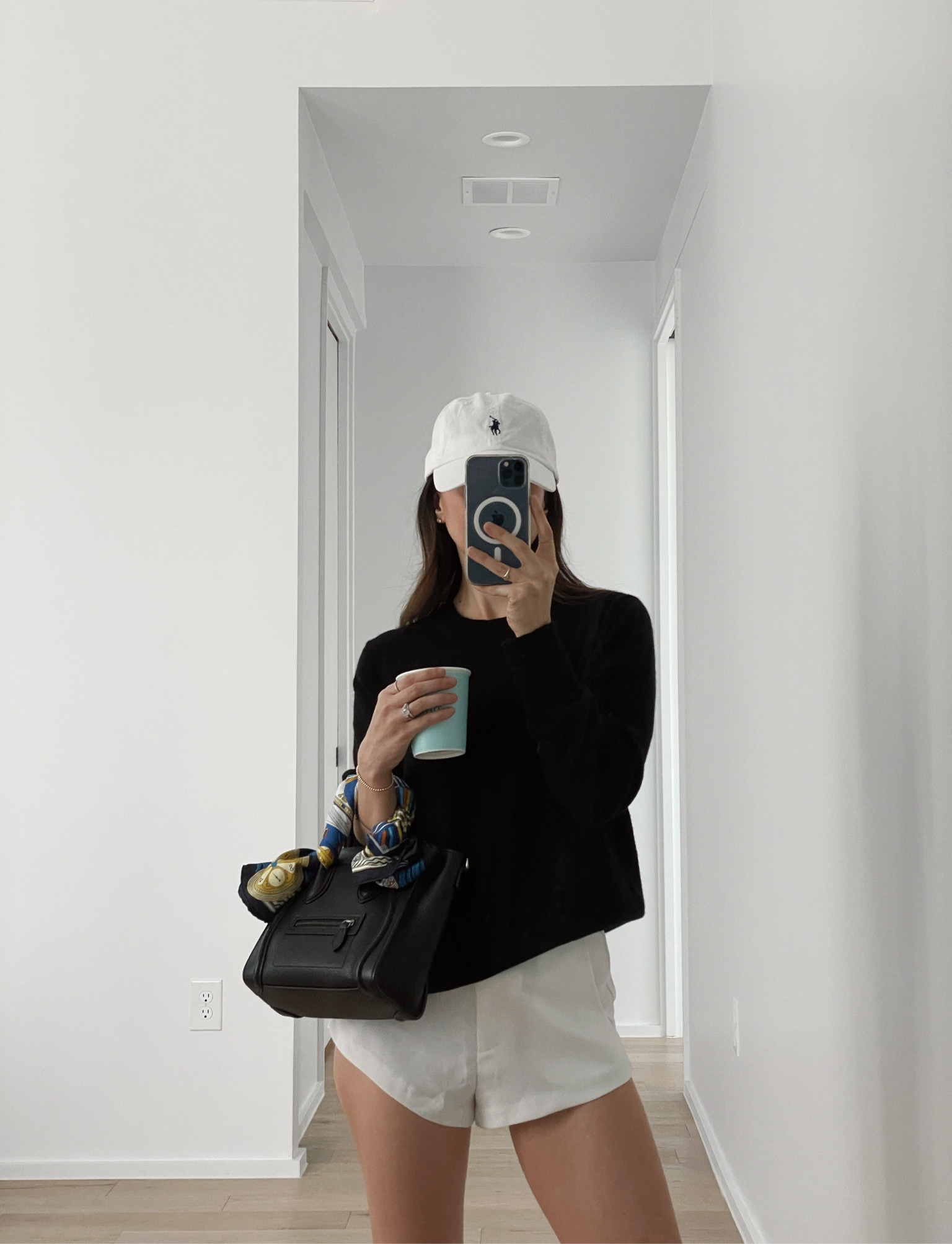 What to wear to a casual lunch date. I’m always cold so I love a light weight sweater and these micro shorts are my go to for summer. #summeroutfits #whiteshorts #casualoutfit 

#LTKFindsUnder100 #LTKStyleTip #LTKSeasonal