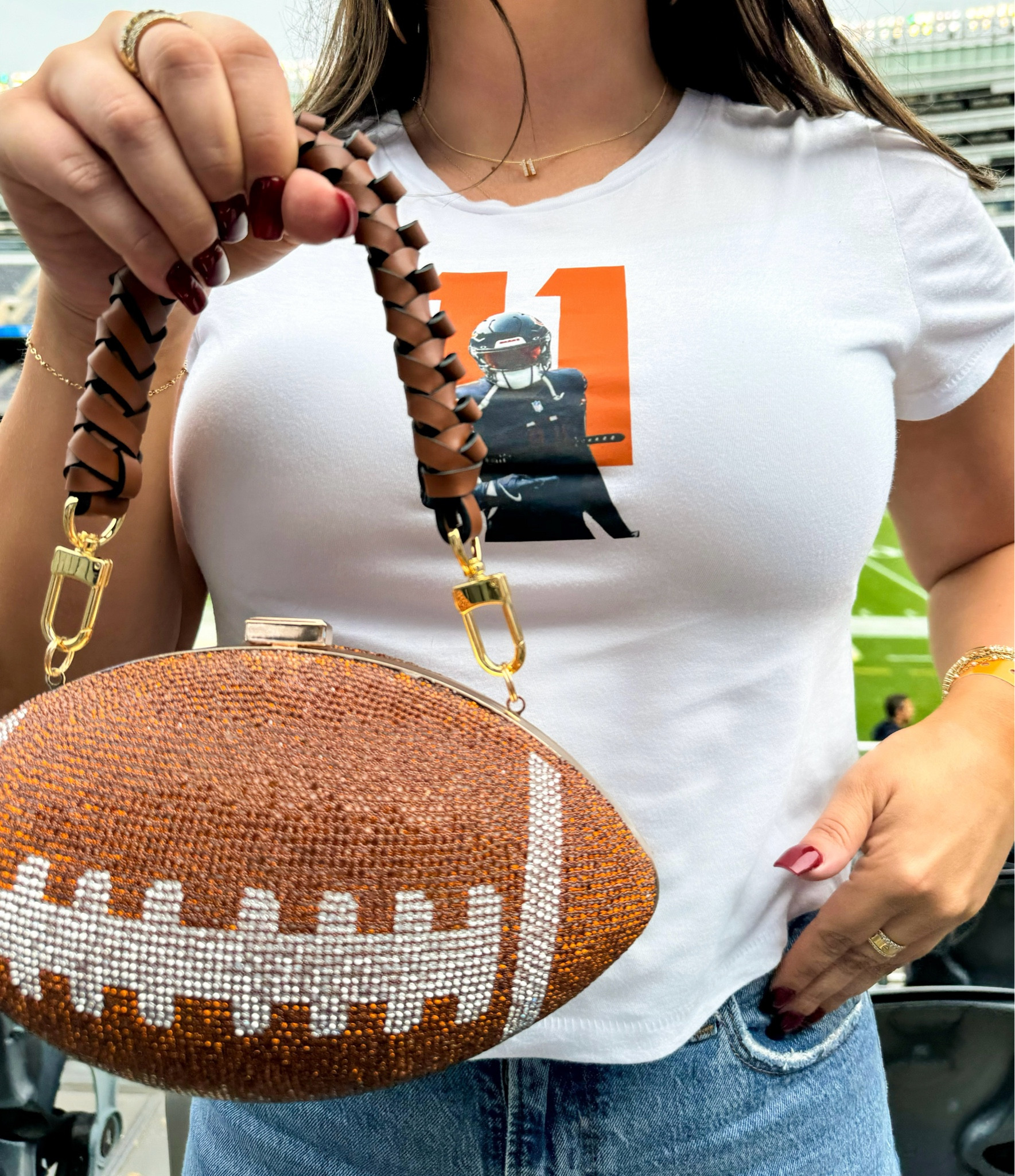 LOVE this crystal football purse for game days!!! It actually comes with a gold crossbody chain too (I swapped it out) but I’ll include the one I did use below as well! And how cute is this number necklace too!! #gameday #ootd #footballgame

#LTKFindsUnder100 #LTKFindsUnder50 #LTKStyleTip
