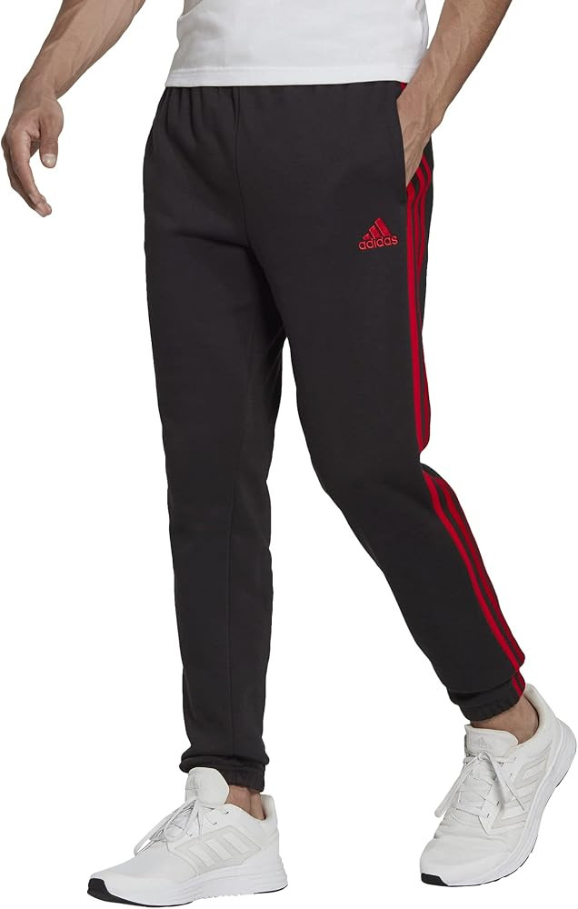 adidas Men's Essentials Fleece Tapered Elastic Cuff 3-Stripes Pants | Amazon (US)