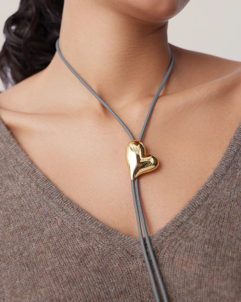 Add a touch of Western flair to your look with this stunning Art Heart Bolo Tie! It’s the perfect blend of modern artistry and classic desert vibes. Whether you’re dressing up a button-down or adding an edge to a simple tee, this piece is a total conversation starter. Shop it now on my LTK! 
#LTKaccessories #BoloTie #WesternChic #CowboyCore #BohoStyle #JewelryInspo #ArtHeart #StatementJewelry #WesternFashion #StyleDetails #AccessoriesOfInstagram 

 #LTKU #LTKBeauty #LTKTravel