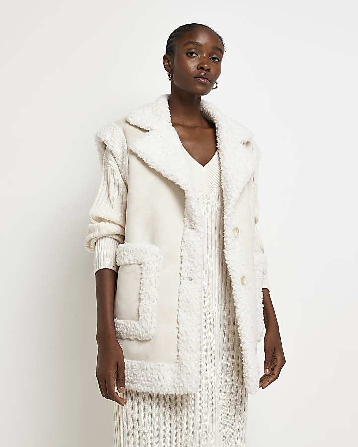 Beige faux shearling gilet | River Island (US)