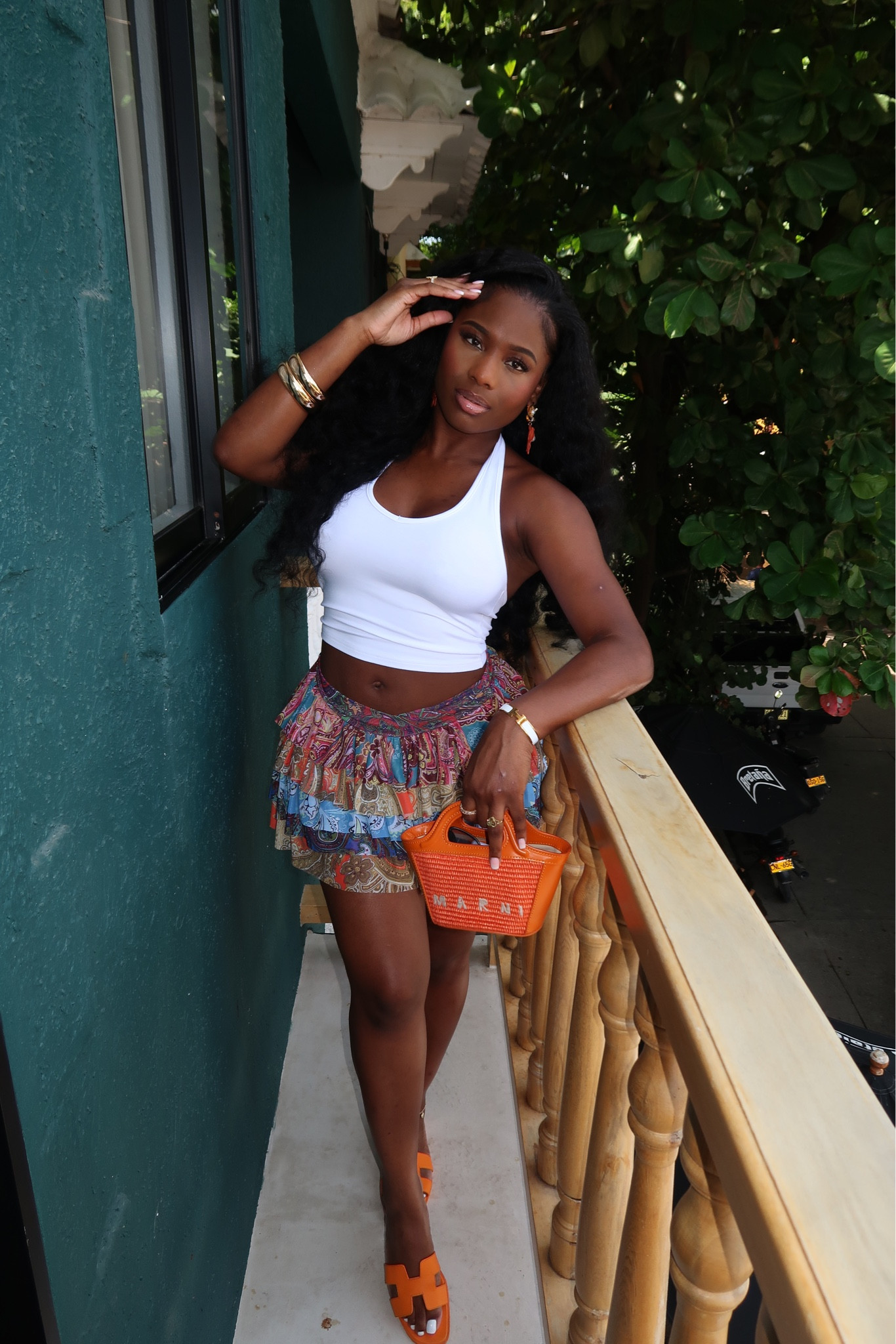 Vacation Outfit Inspo 🧡
Earrings: Linked Below
Top: Linked Below
Bag: Linked Below

Skirt Link: https://www.slayja.com/products/patchwork-skirt?_pos=13&_sid=dd3e1326e&_ss=r

Sandals: Hermes Oran (The color I have in this style is sold out)  | Linked a similar style from Steve Madden!

Bracelets: Hermes & 
Fashion Nova: https://www.fashionnova.com/products/rare-find-3-piece-bangle-set-gold


#LTKstyletip #LTKtravel #LTKbeauty