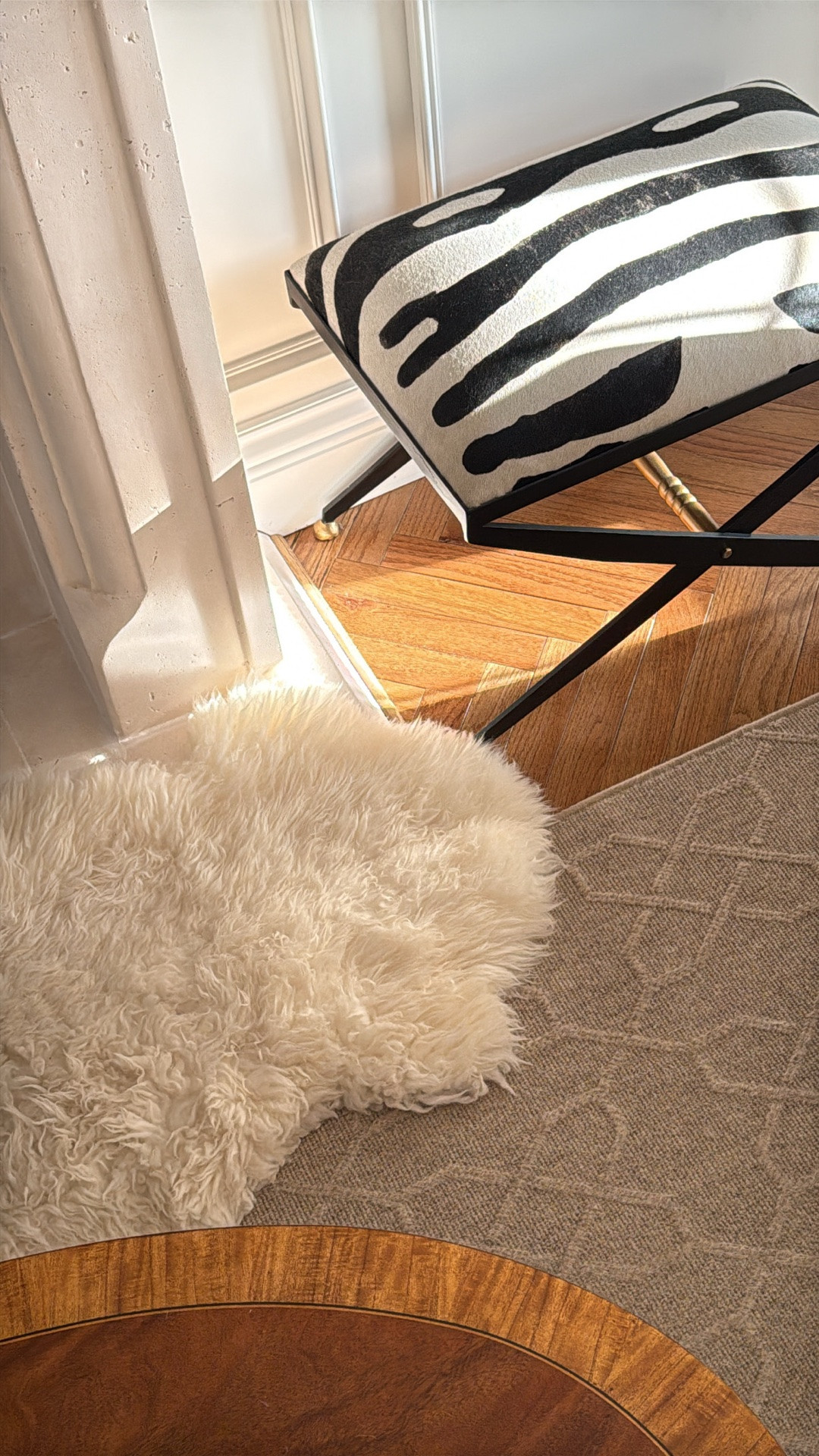 Still loving our zebra ottomans, six years later!

#LTKHome