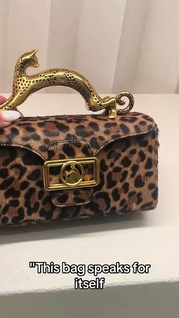 This one doesn’t whisper luxury… it owns the room 🐆✨
Statement leopard + bold gold = instant elevate. I reach for this when I want my outfit to do the talking—day to night, zero effort. Trust me, this is the bag people stop you for.

Shop it now before it’s gone 🤍👇

#LTKstyle #LTKitbag #LuxuryStyle #StatementBag #LeopardPrint #ChicStyle #FashionOver40 #ElevatedStyle #DesignerVibes #OOTD #StyleInspo #WardrobeStaples