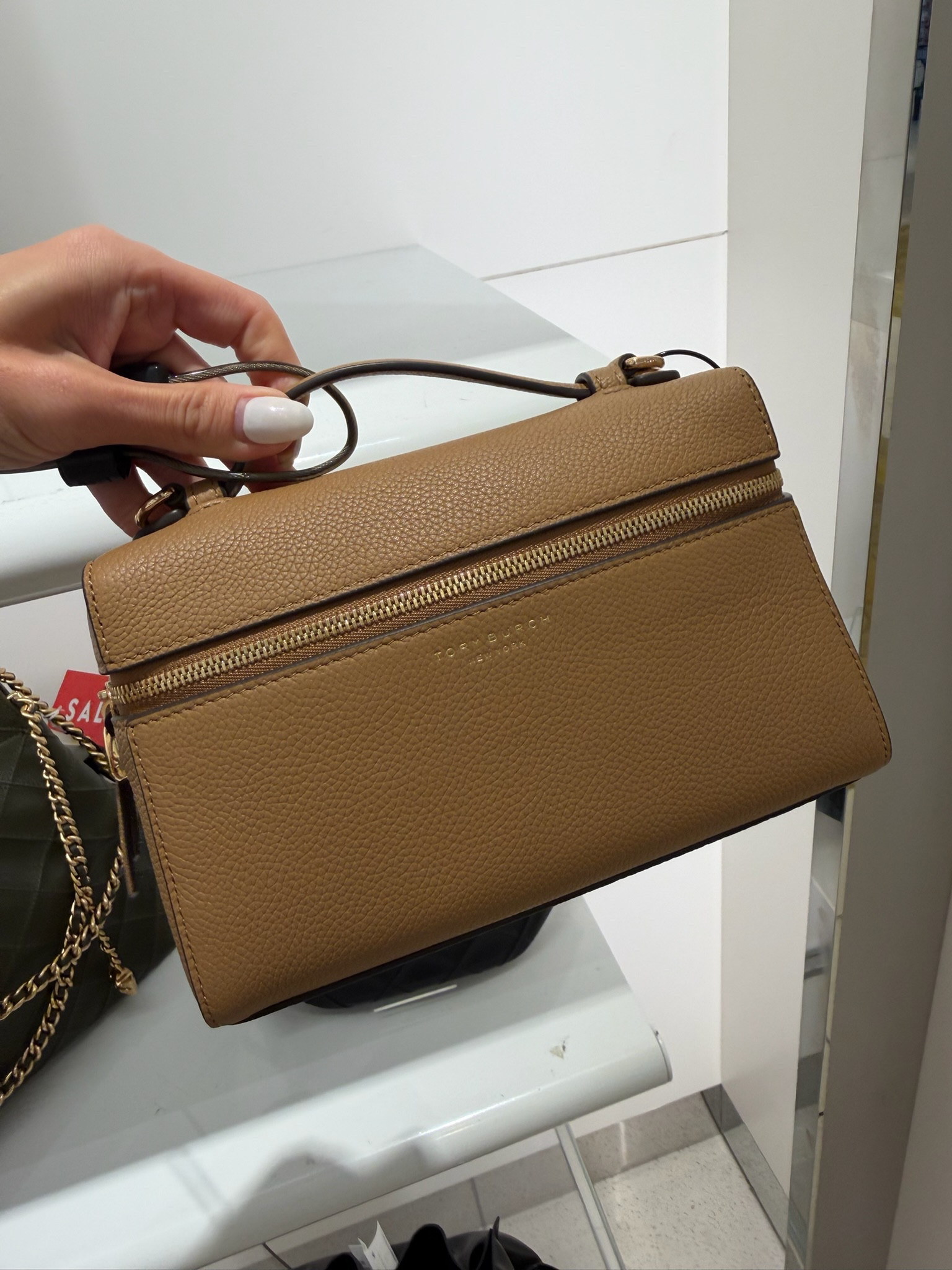 this bag is such a staple. the color is perfect for year round and it fits so much without feeling bulky. love the top handle moment but also comes with a strap so you can wear it crossbody

brown handbag, everyday bag, crossbody bag, neutral accessories, classic style, minimal outfit, capsule wardrobe, travel bag, mom bag, annabrstyle 

#LTKSeasonal #LTKMothersDay #LTKootd
