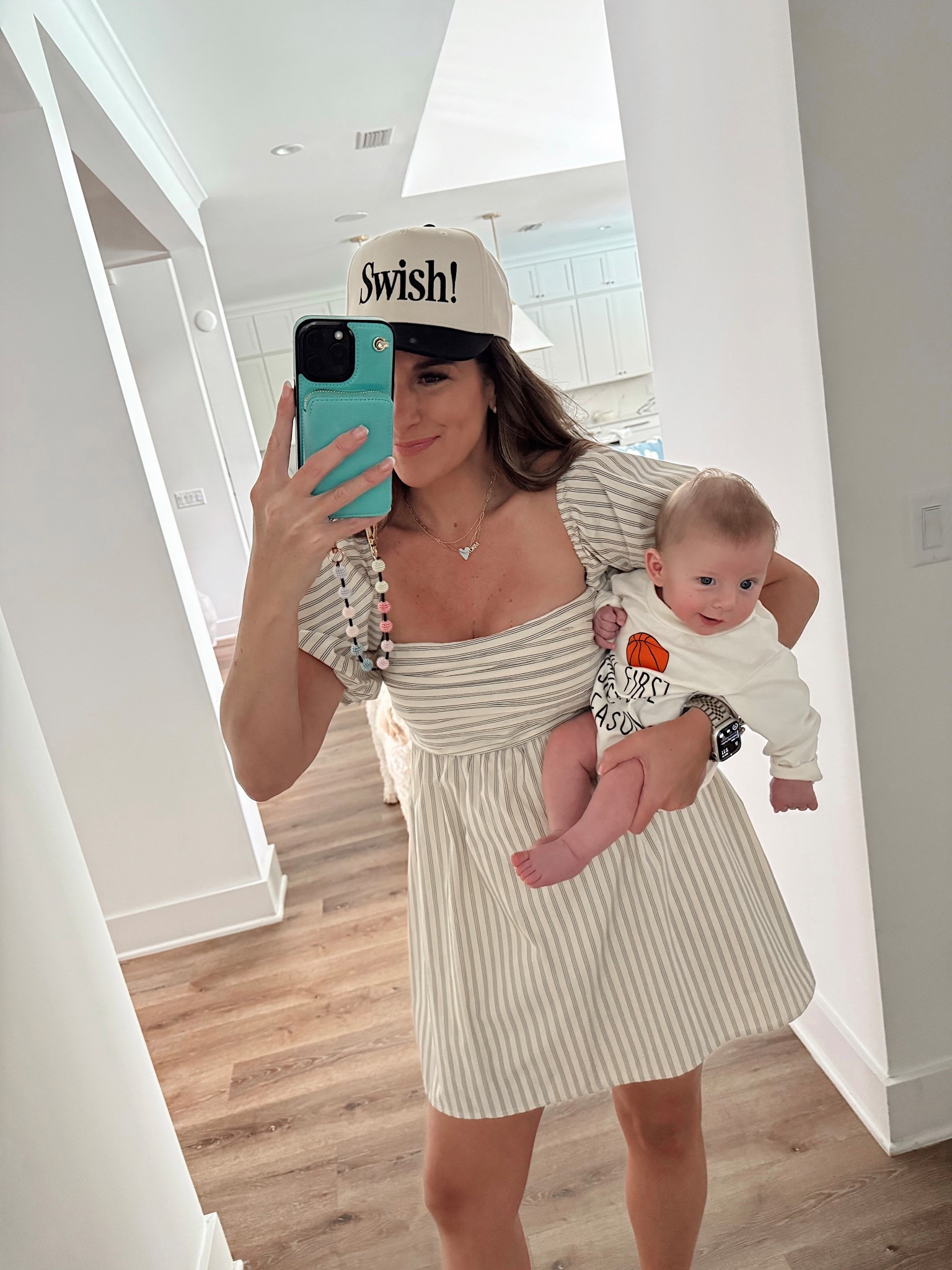 In a size medium in dress with shorts. March madness basketball 