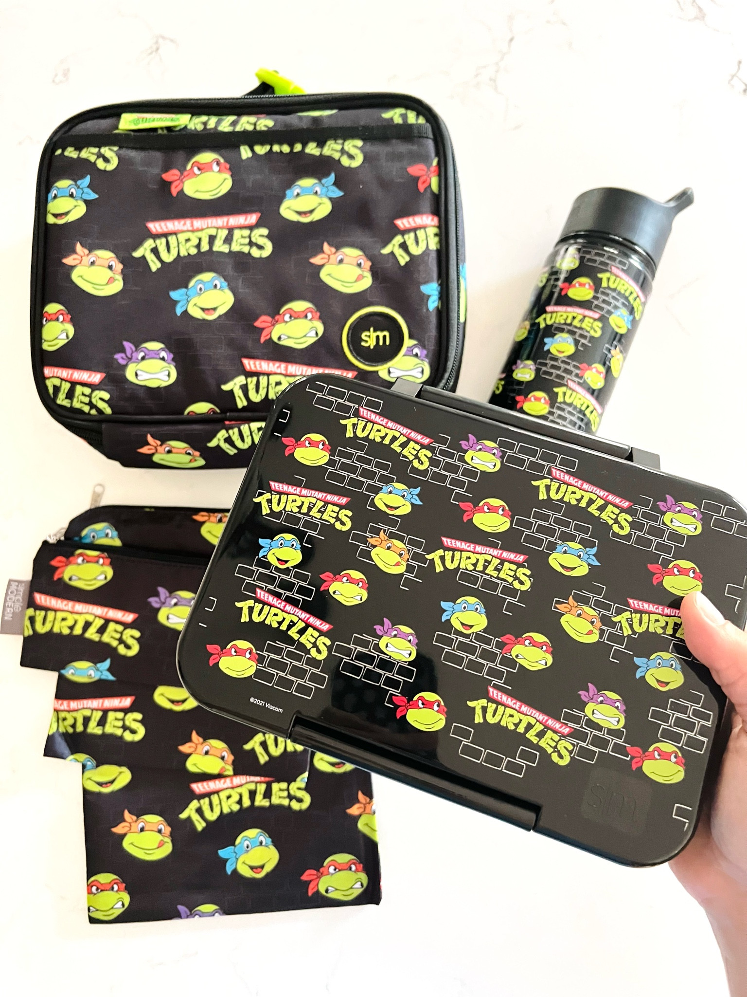 Ninja Turtle lunch box and gear

#LTKkids