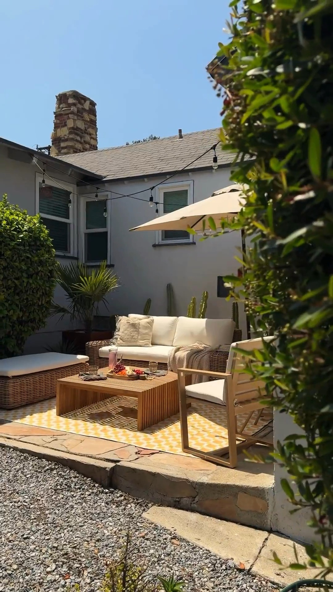 a much needed refresh 🌱 giving the patio a good deep clean to prep for summer! eddie power washed the bricks and pulled out all the weeds, then we added some new pieces from @allmodern to make the patio feel fresh and new ✨ a fun geometric outdoor rug, a sleek teak coffee table, a pair of solid acacia wood chairs, and a planter box that turned into a very fun science project 😂 the raw steel is made to develop a rust color over time, but we followed the planter instructions to speed up the process for that beautiful warm patina overnight. 

fast + free shipping courtesy of AllModern! 🤍 #allmodernpartner #modernmadesimple 

#LTKHome #LTKSeasonal