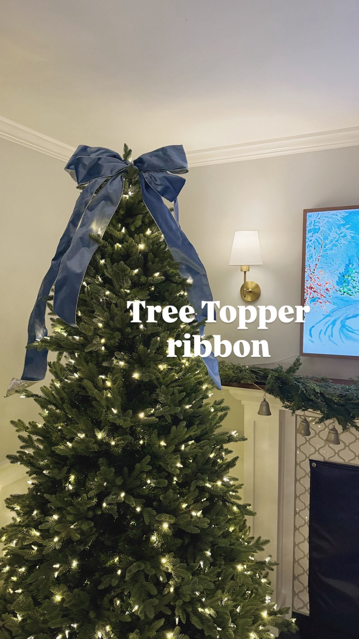 Tree Topper Ribbon
I just created two separate bows, one smaller one a little larger and used green wire to secure them together and place on the top of my tree 

#LTKHome #LTKHoliday