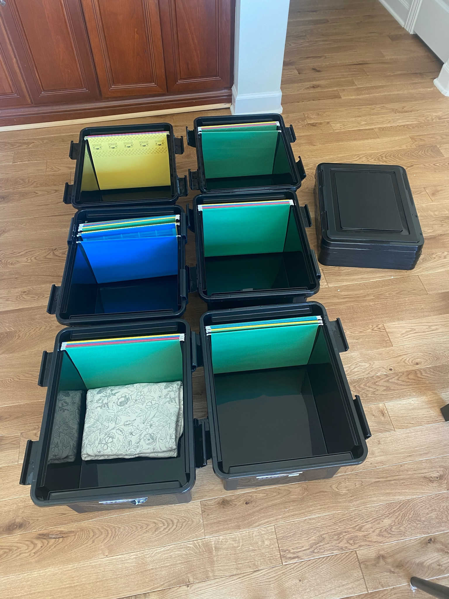 Finally getting to the kids’ keepsake bins! I needed something smaller (we’re looking at six kids, people). My dad and I had built some beautiful wood ones back when I had just two kids. They were just too big and there’s no way we could store six of them! So we landed on these smaller bins with a spot for hanging folders- perfect for saving important papers and organizing by grade, etc! 

#organization #school #kids #schoolwork #home #storagebin 

#LTKkids #LTKhome #LTKfamily
