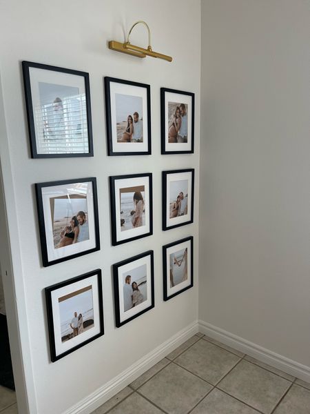 Master bedroom photo walls. We did the photos 4 in. apart side by side and up & down! 

#LTKhome