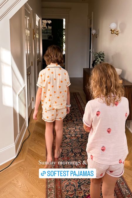 The girls in their new oranges and strawberries spring pajamas. Other prints available on amazon! Polly is wearing a 6-7 in the strawberries and Faye is wearing an 8-9 in the oranges. 

#LTKkids #LTKfindsunder50 #LTKSeasonal