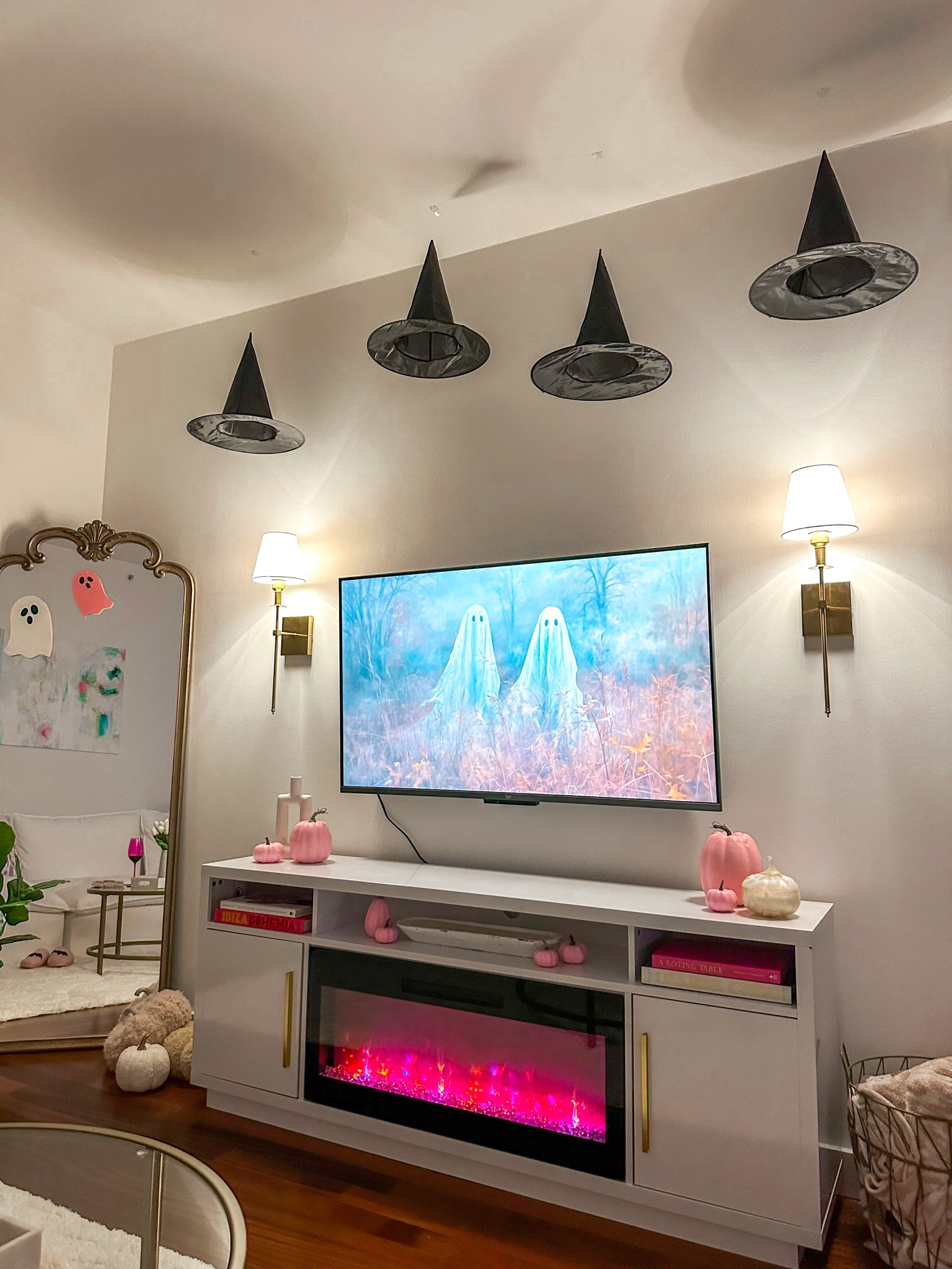 Halloween living room decor with hanging witch hats🧙‍♀️🎃

#LTKHalloween #LTKparties #LTKSeasonal