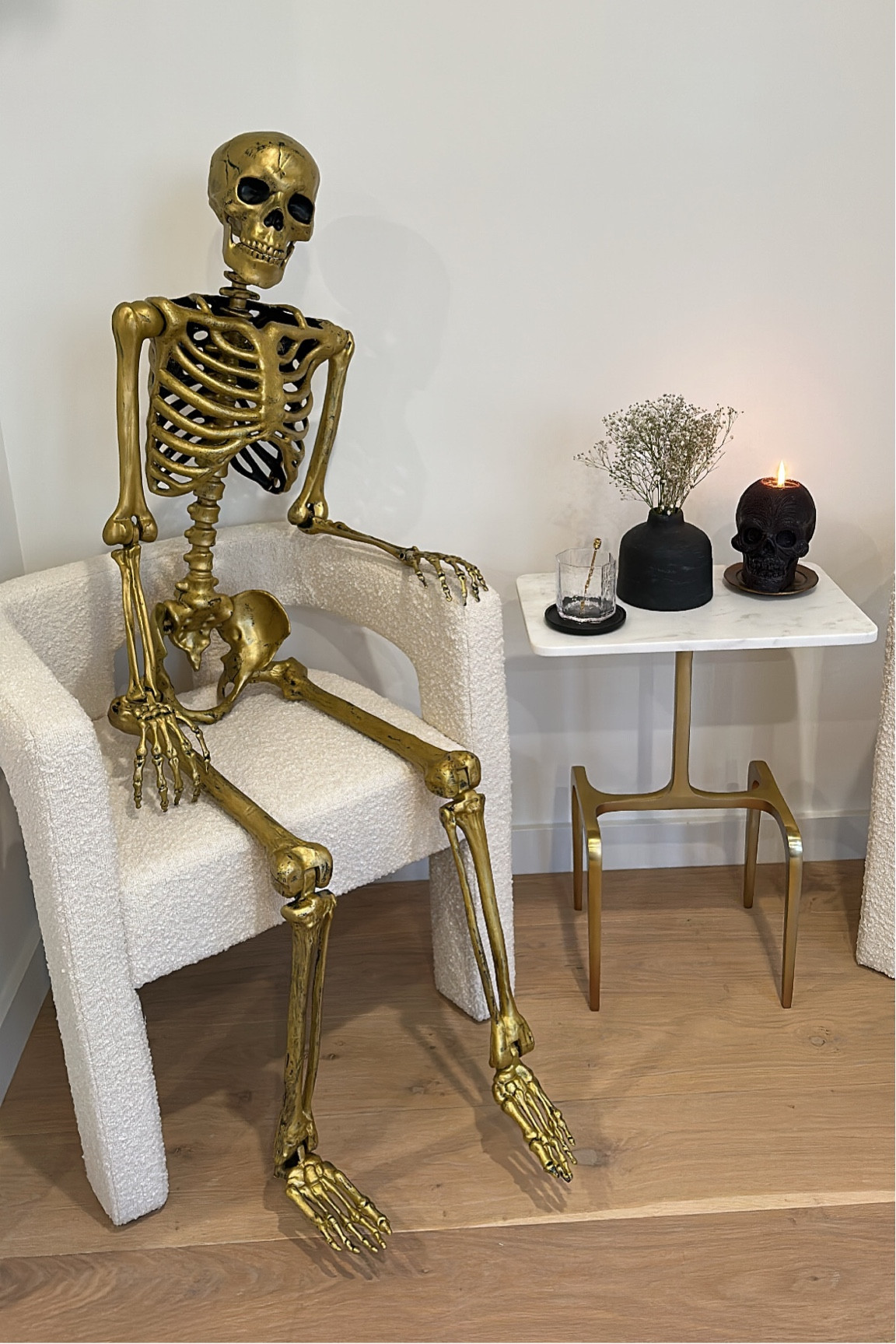 🕷️💀🖤 Happy October! Time to officially start decorating your homes for spooky season. 

#skelaton #chair #sidetable #candle #cb2 #boucle 
#skull


#LTKHoliday #LTKHalloween #LTKfindsunder50