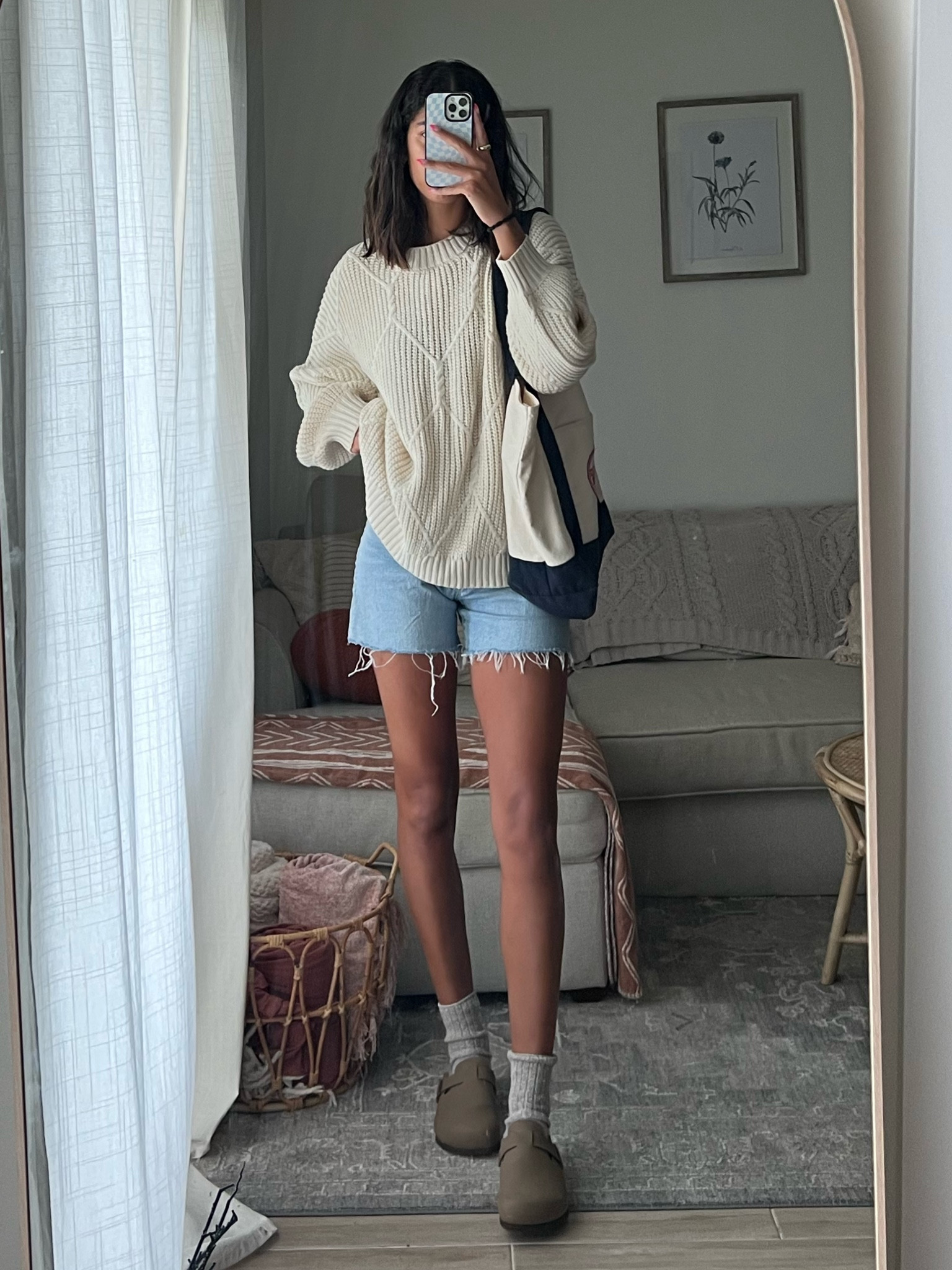 Trader Joe’s outfit ! 

sweater: Logan sweater from grey bandit (code: KYRA15)
denim shorts: H&M
socks: dsw
Clogs: Amazon (Birkenstock Boston dupe) 
Tote bag: Trader Joe’s 