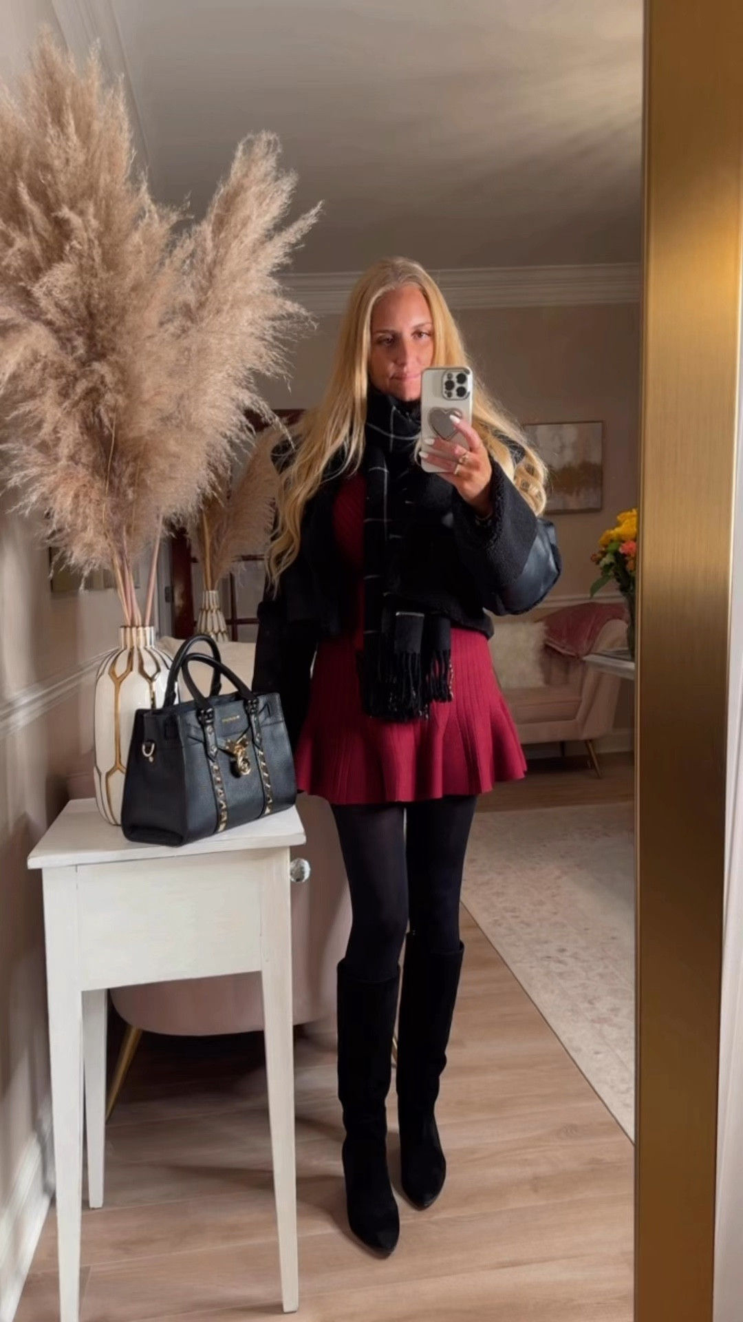 The cutest fall outfit in burgundy and black! I adore how this mini sweater dress has a flare skirt, so fun and flirty! Also I am obsessed with this black cropped coat because it’s so warm! Wearing a small in the coat and dress. Also linked my favorite black knee high boots! 

#LTKHoliday #LTKSeasonal #LTKStyleTip