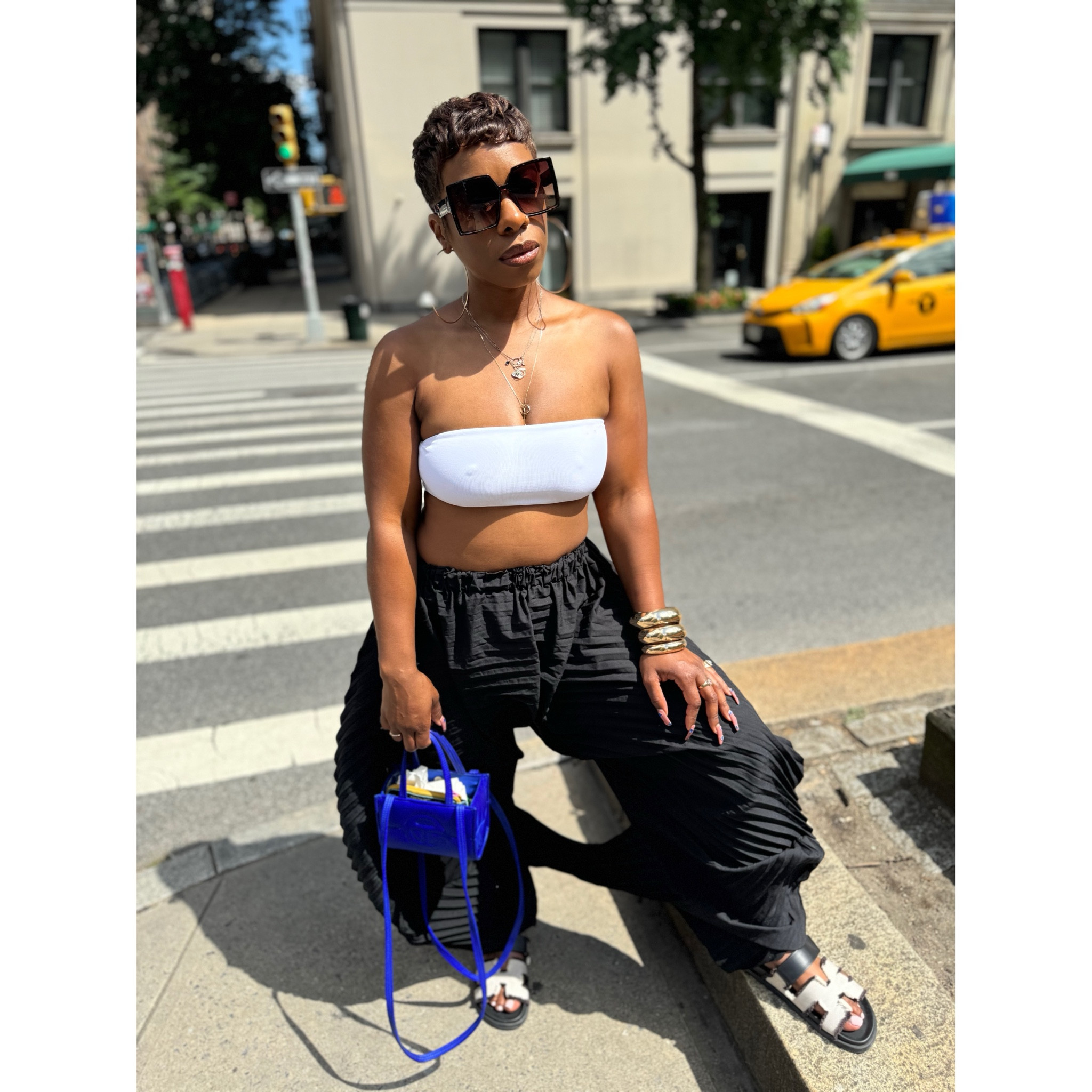 This little tube top is getting me through the season! I love creating balance in a look by pairing something very fitted with something very voluminous. The designer of these pants aren’t on this site but I linked some pants with flare and volume for you to recreate the look 

#LTKStyleTip