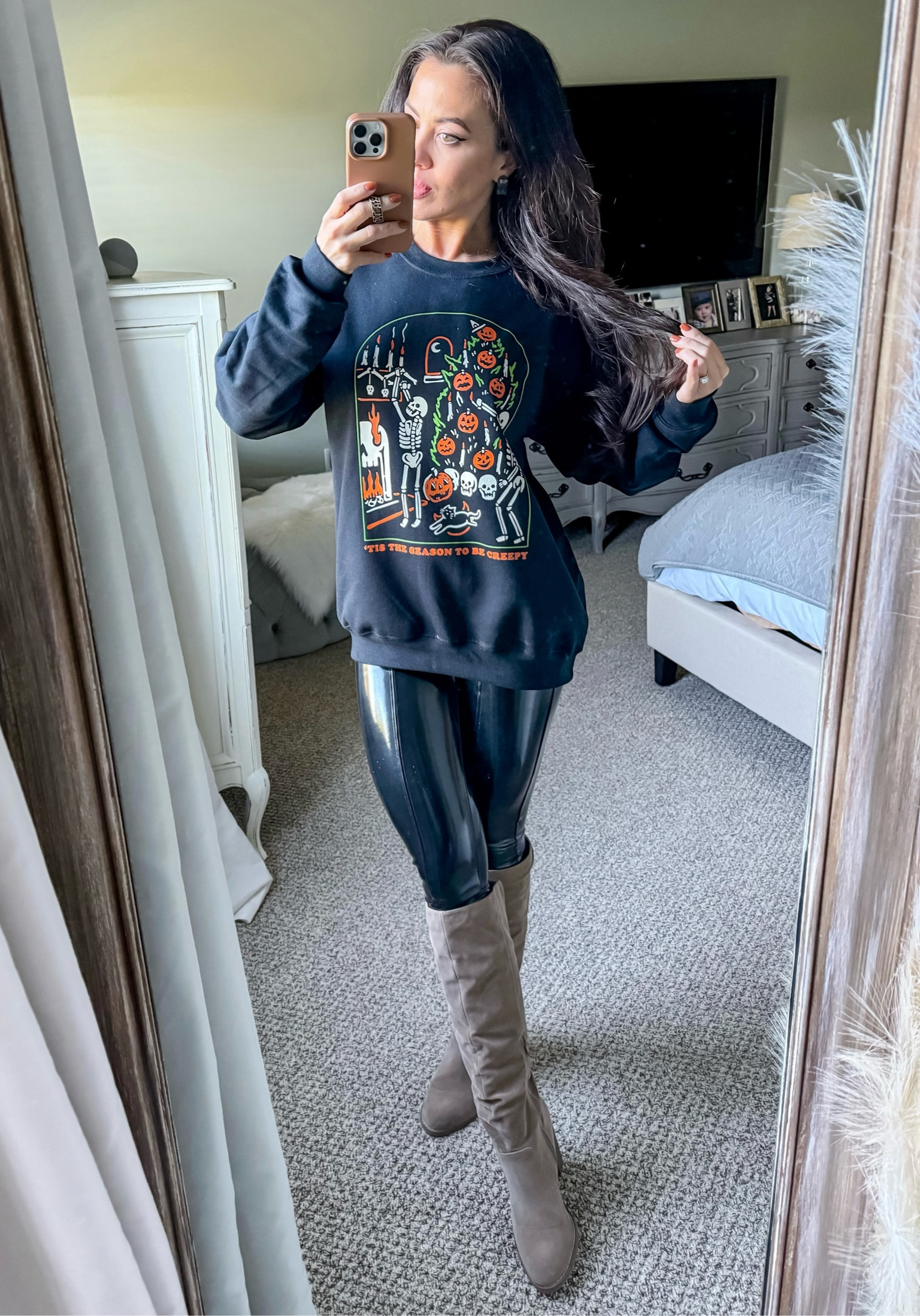 Halloween sweater. Spanx patent leather leggings. Slouchy boots. Haunted house outfit  

#LTKHalloween #LTKfindsunder50 #LTKshoecrush