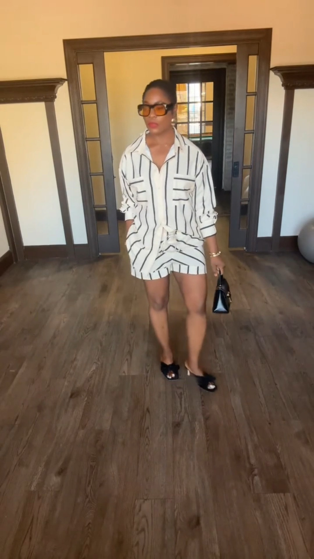 This striped two-piece set is my new go-to 🤎 Oversized collared shirt paired with matching shorts, styled with black bow mules and a mini top-handle bag for an easy elevated look. Perfect for warm fall days or a transitional weekend outfit. Every piece is Amazon and under $50 — shop the full look below before it sells out!

Follow for more early Fall Outfits! 

#LTKstyletip #LTKfindsunder50 #LTKSeasonal #amazonfinds #falloutfits #ootd