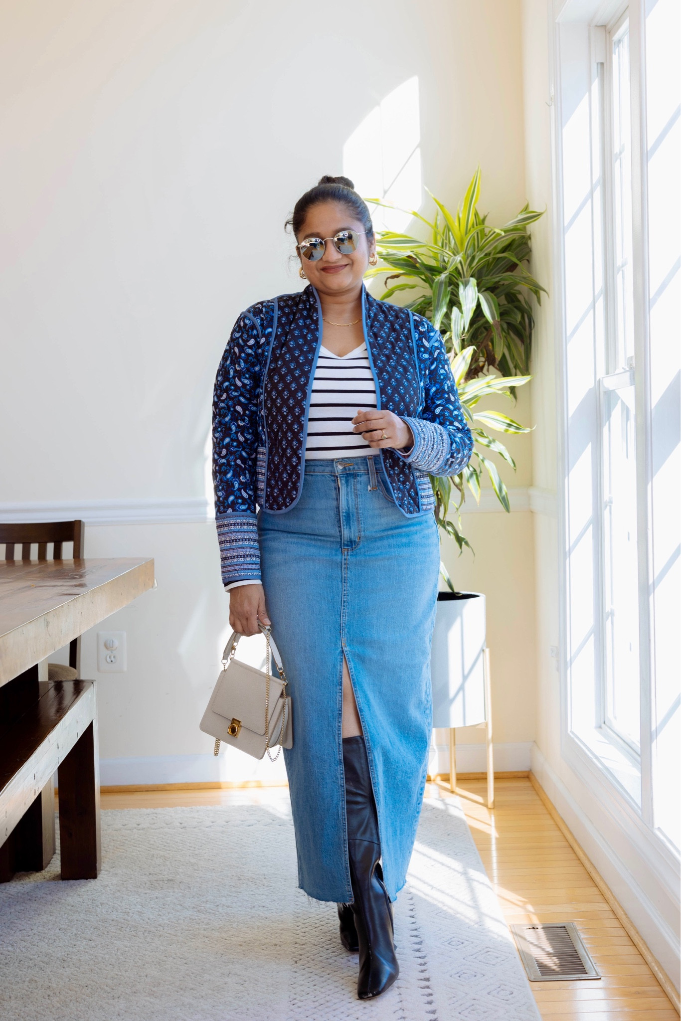 Chic Outfit with denim skirt and reversible quilted jacket 
@target denim skirt in size 8 (tts)
@gap tee in size S
@amazon quilted reversible jacket in size S 
@polene bag 

#LTKmidsize #LTKMostLoved #LTKSeasonal