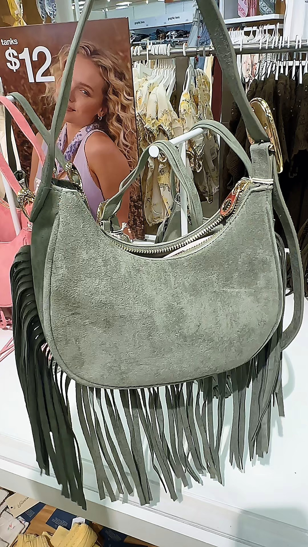  this faux suede fringe purse from Target is perfect for spring? The green is so fresh, the pink is giving soft feminine, and the brown is classic western. @Target 

#LTKootd