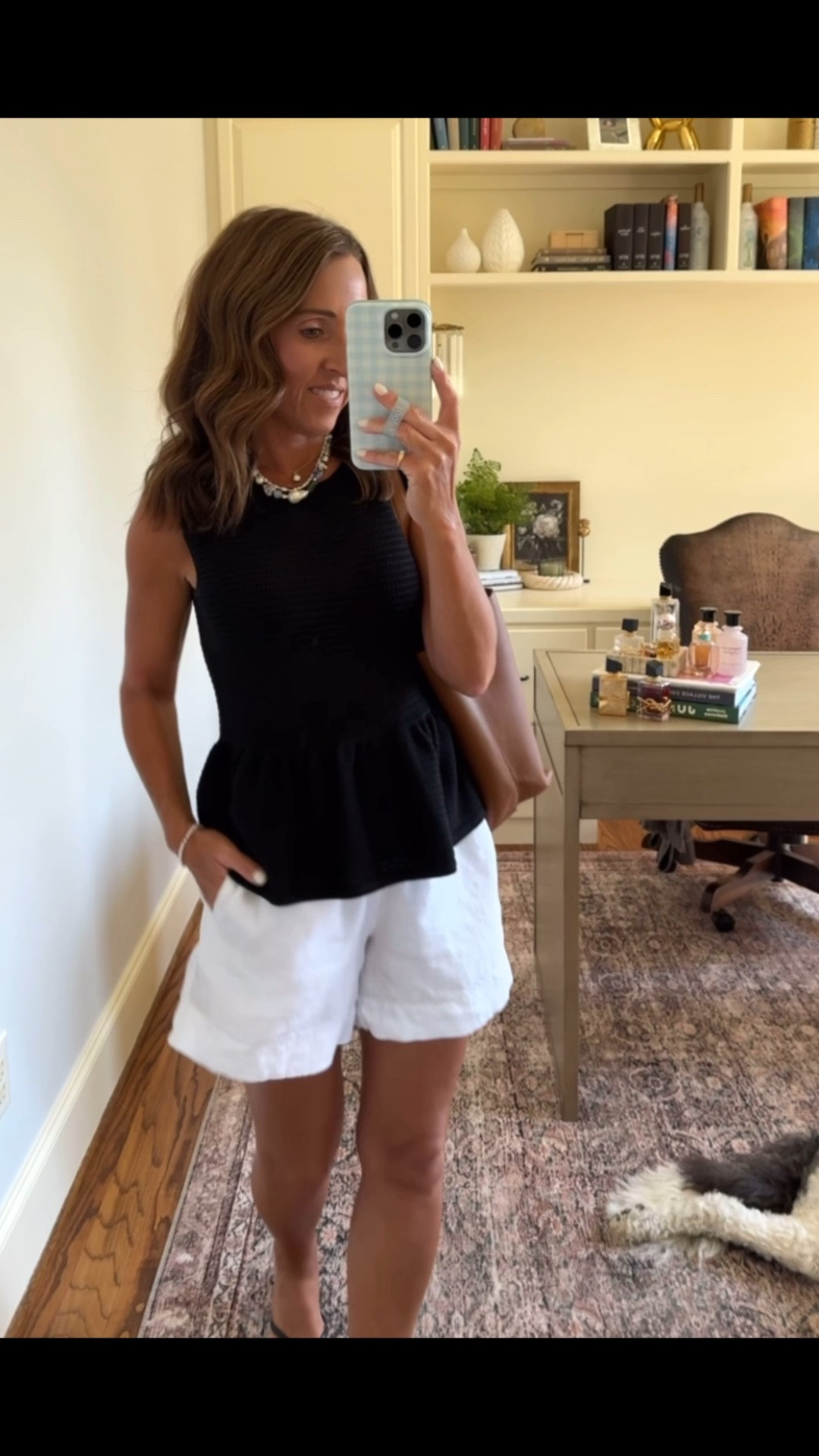 White linen shorts with a peplum sweater tank. Black & white.
Both XS.

#LTKootd #LTKSeasonal #LTKOver40