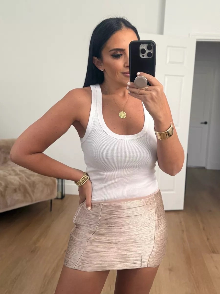 Strappy rib top wearing size medium only $12. Fringe mini skirt wearing size small.

