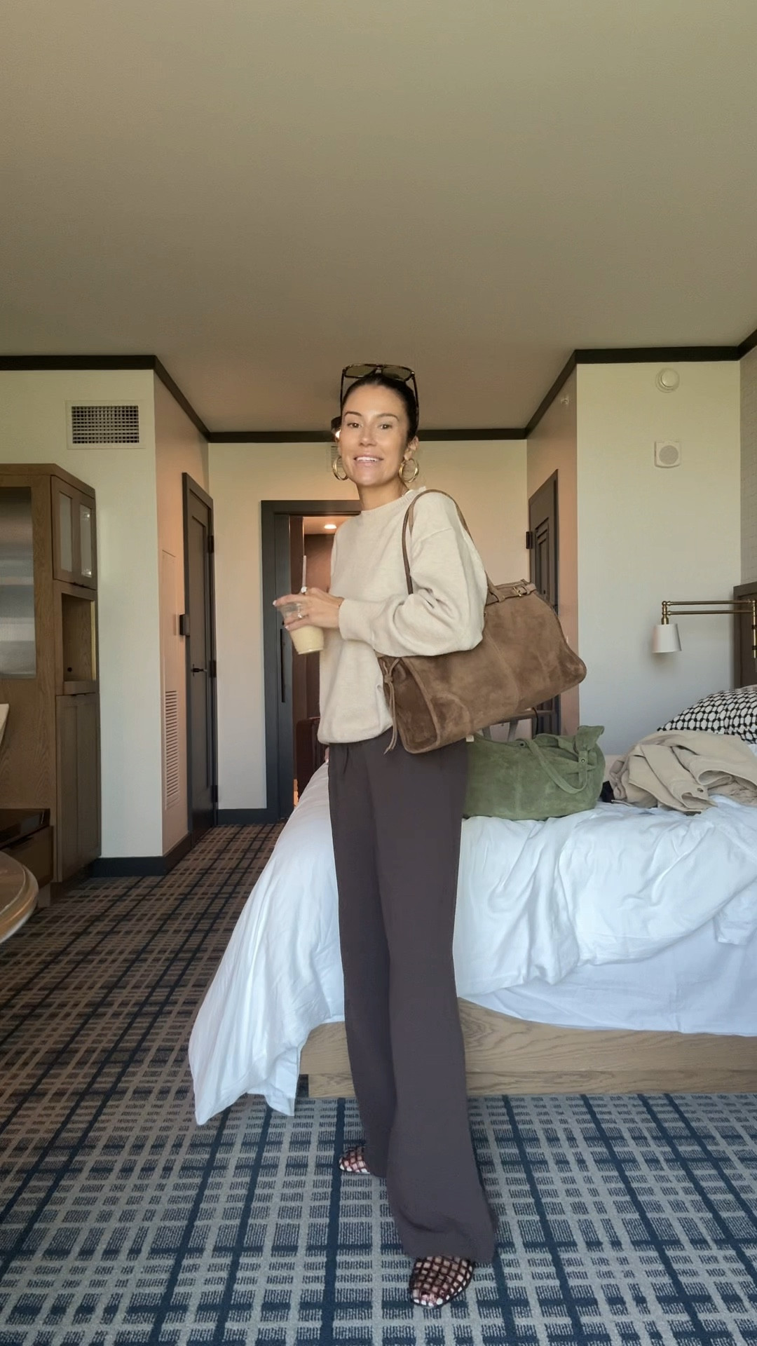 The simplest way to overcome the sweats & leggings rut for a cute airport outfit ✈️ these pants are so comfy and wrinkle free!! 🙌🏼 
Sizing-
Sweater: medium
Pants: small regular length (I’m 5’7”)

Aritzia pants, travel outfit, airplane outfit, casual outfit, work pants, brown pants, fall outfit, fall fashion 

#LTKSeasonal #LTKStyleTip #LTKTravel