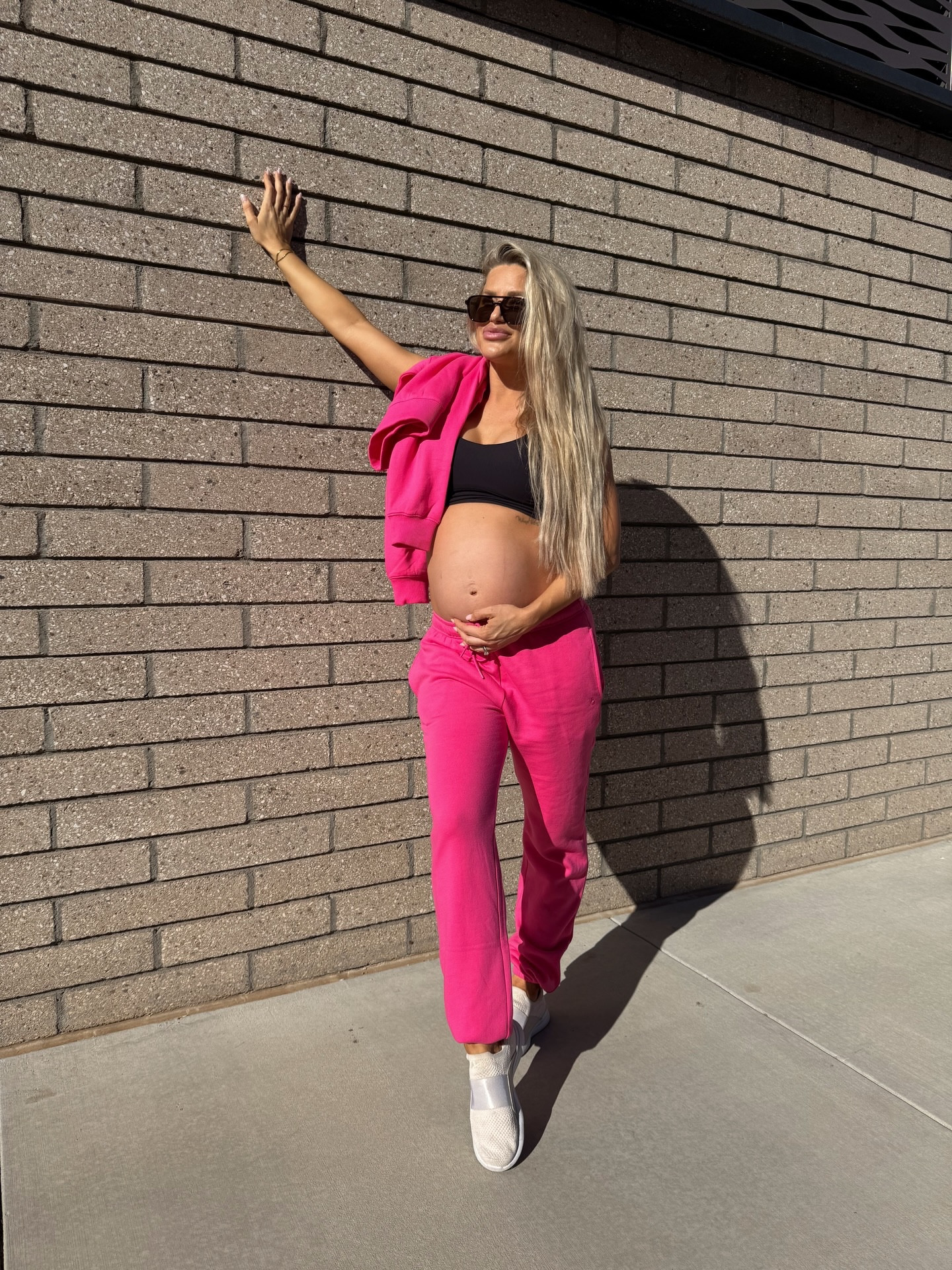 buffbunny essentials collection drops today 🎀🤍 

code ashleywilke10 saves you $$$ & supports my growing family! 

wearing the @buffbunny_collection threads pullover (s) & jogger (xs)  in color miami pink + poshknit sports bra (m) in black 

#loungewear #pregnancystyle #buffbunnycollection