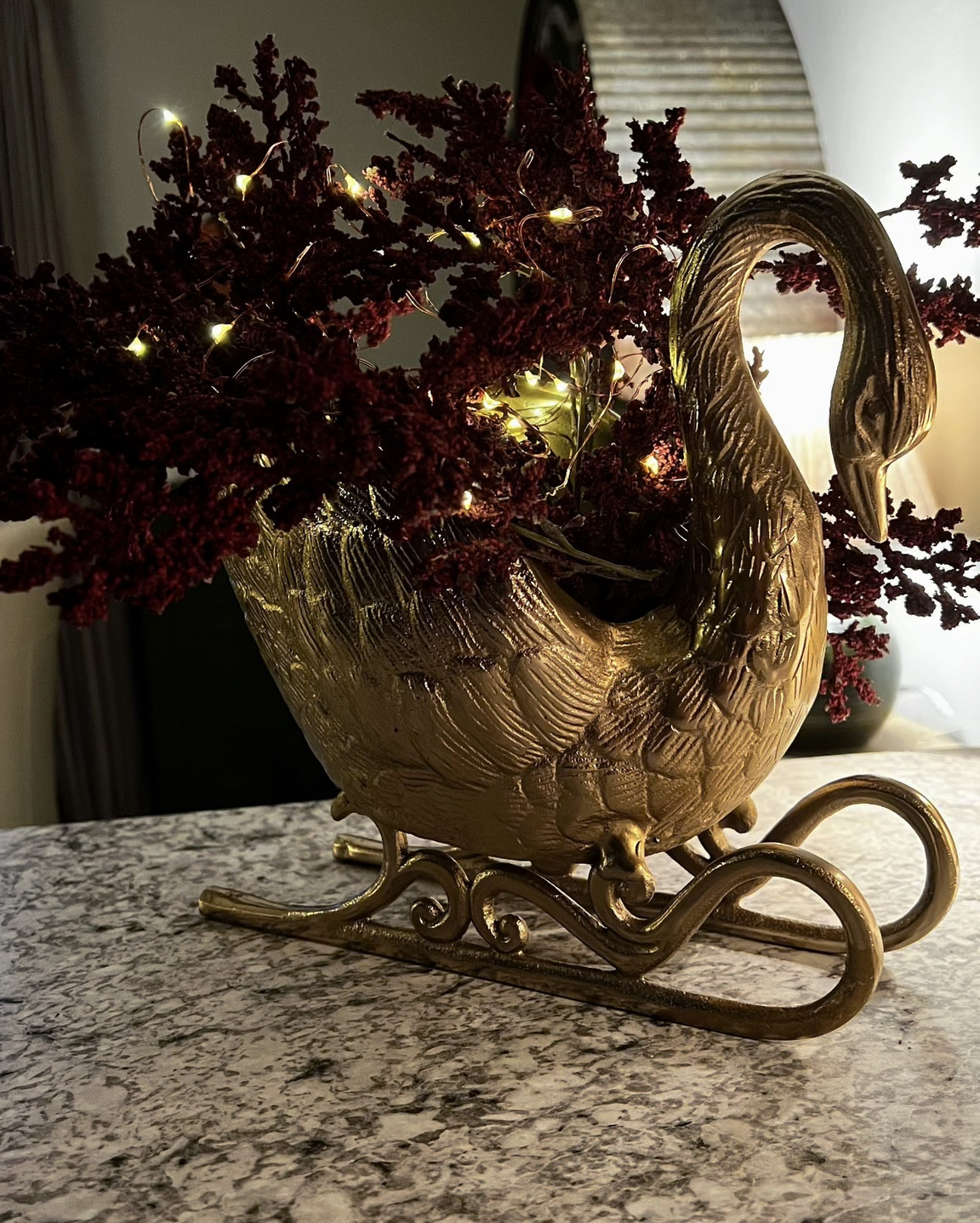 Beautiful swan with stems and fairy lights 

#LTKHoliday #LTKSeasonal #LTKHome