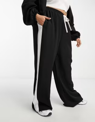 ASOS DESIGN Curve pull on pants with contrast panel in black | ASOS (Global)
