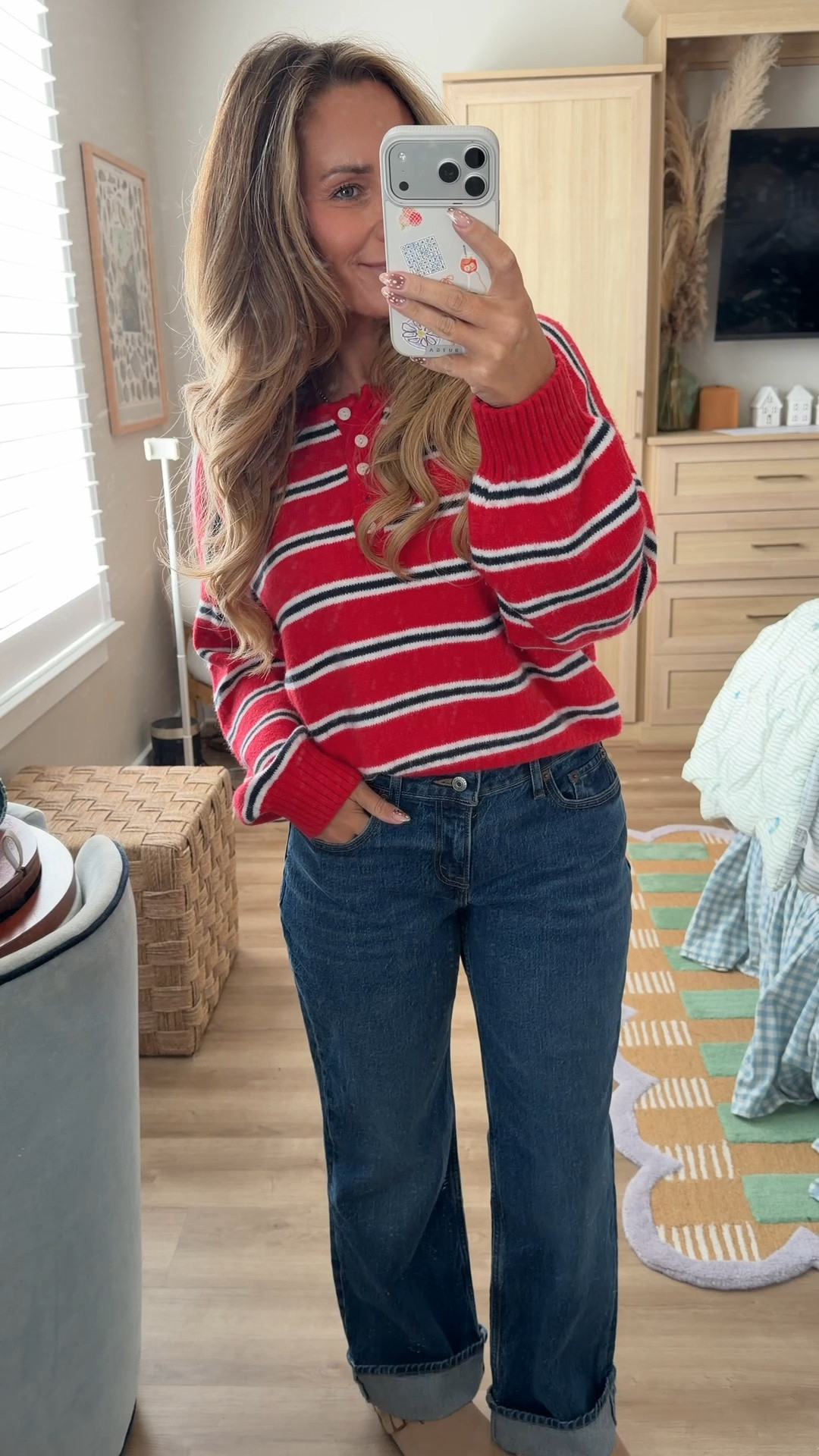 My fall uniform ❤️ A red striped sweater (the collar detail makes it feel so polished) with dark-wash jeans cuffed once to hit right at the ankle at 5'2"