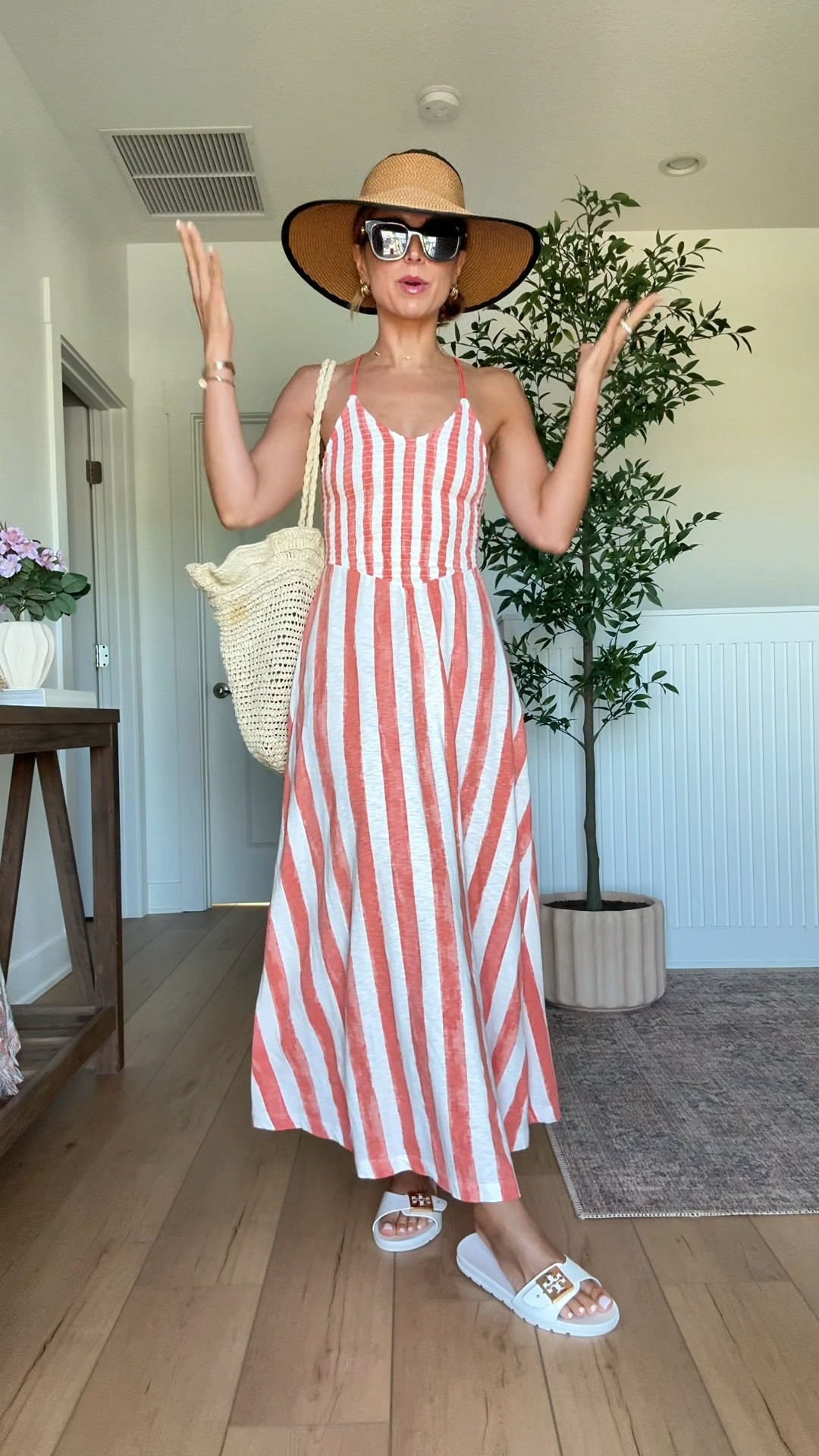 My beach outfit of the day! XXS in striped maxi dress! Beach day. Resort outfit. Resort wear. Vacation outfit. Vacation dress. Tory Burch buckle jelly sandals. Eric Javits packable UPF 50+ hat. Target straw bag. Gucci sunglasses. 


#LTKTravel #LTKSwim #LTKootd