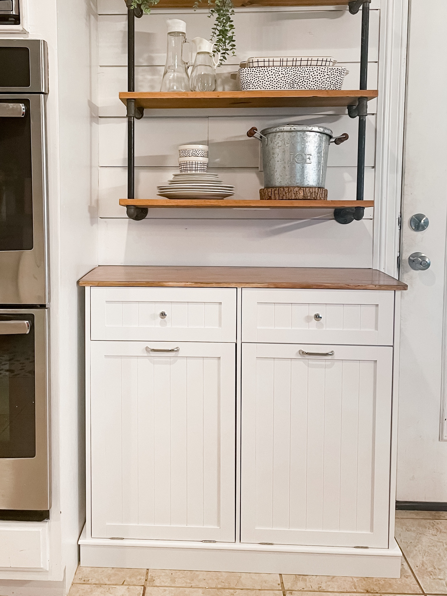 Loving my new double trash can cabinet! Hides the trash but is still so convenient!!

Amazon home
Home organization 

#LTKhome