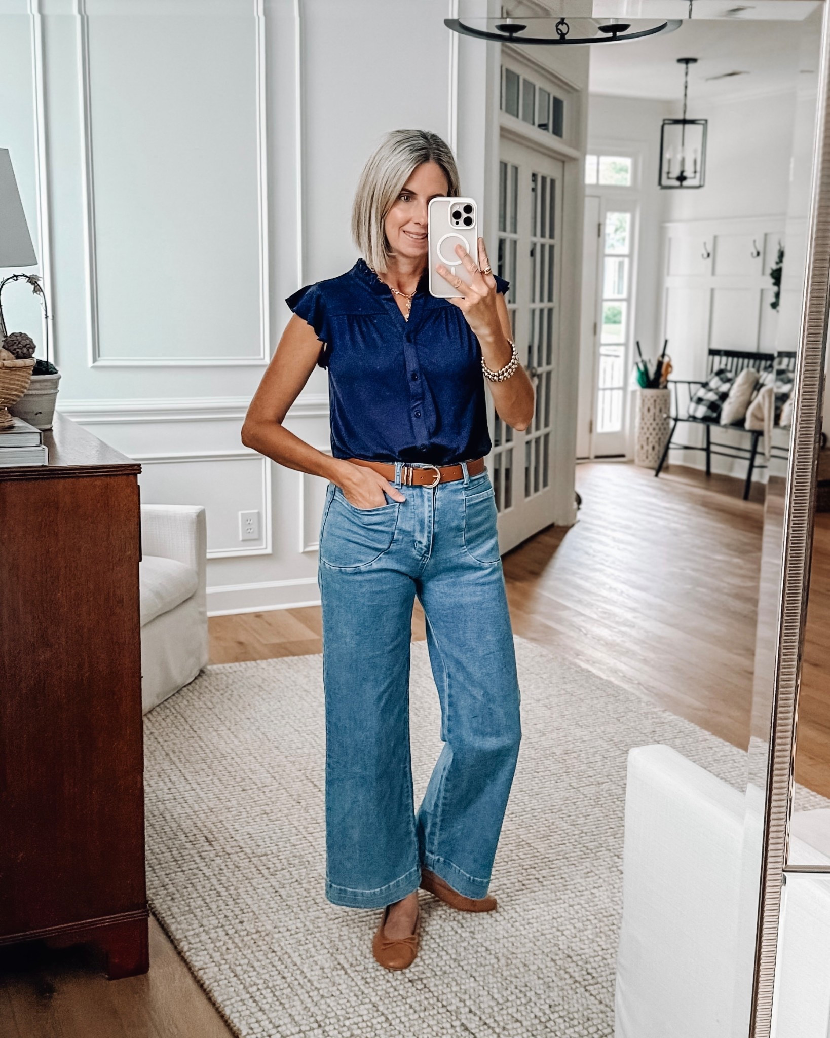 Amazon finds: ruffle cap sleeves & the perfect patch pocket jeans 🙌 wearing small top and size 4 jeans but could have sized up one in the jeans. Top has cute ruffle sleeves and buttons all the way down. 

#LTKSeasonal #LTKOver40 #LTKFindsUnder50