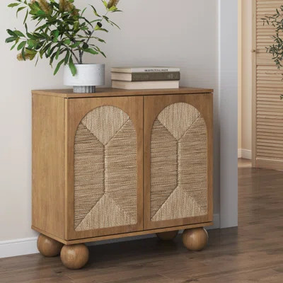 Coran Boho Storage Cabinet with Ball-Style Feet and Seagrass Door Panels | Wayfair North America