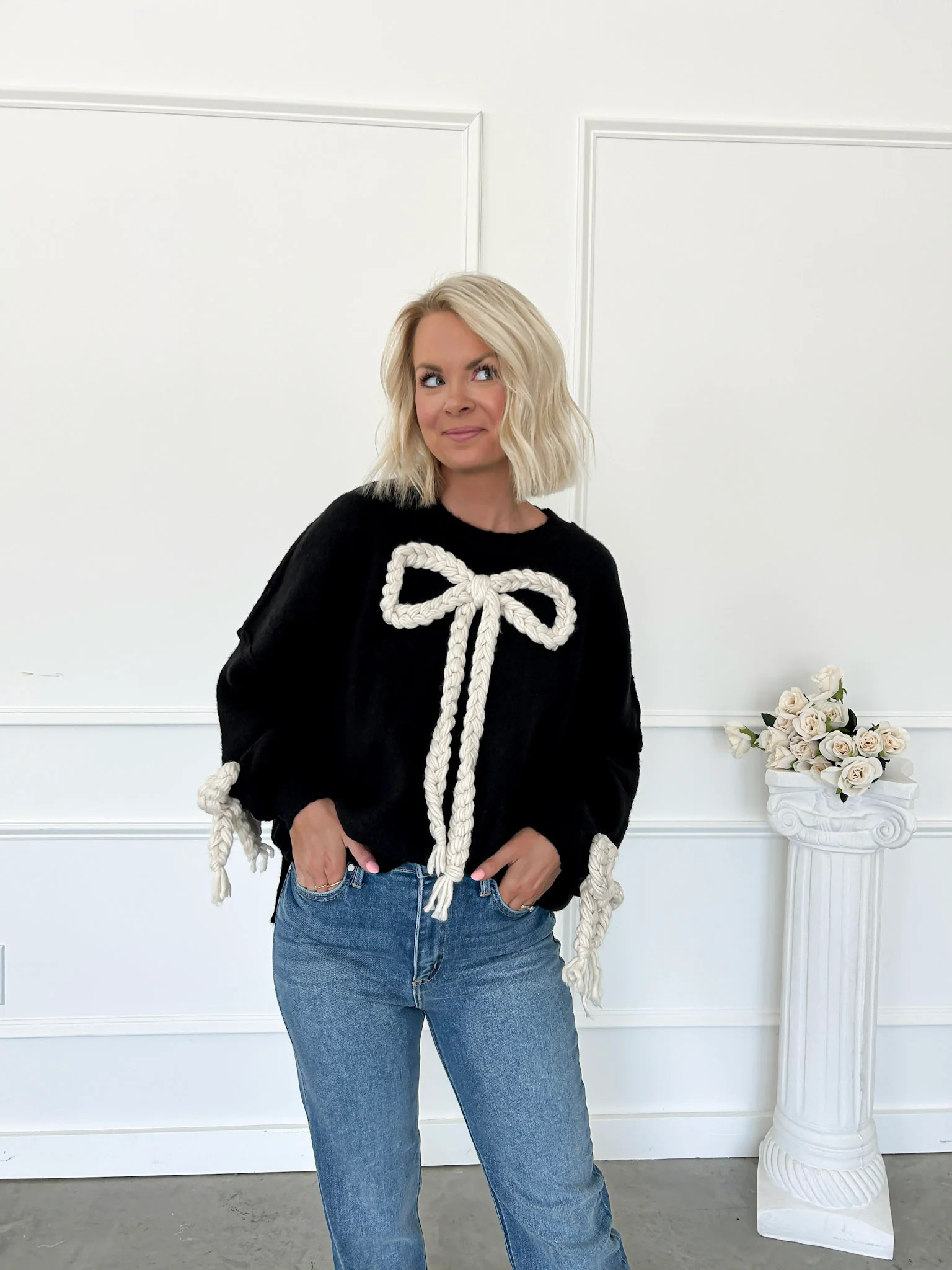 Charmed With A Bow Black Oversized Sweater Small | Flourish in Frills