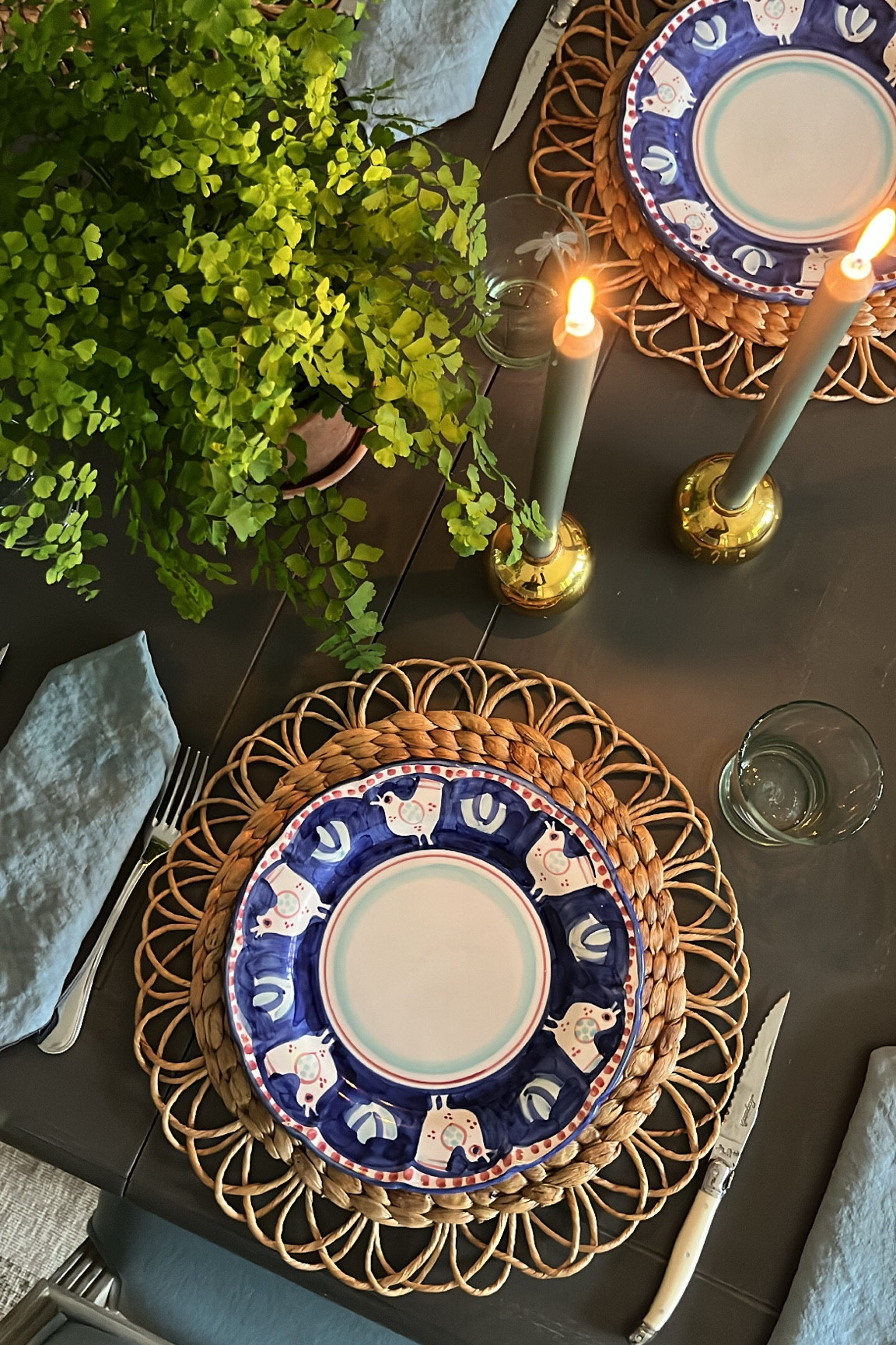 Ferns make a great centerpiece, and candles always seem to elevate even the easiest of table settings. 

Plates are vintage. Taper holders are old Aerin but similar linked. 

#LTKParties #LTKHome