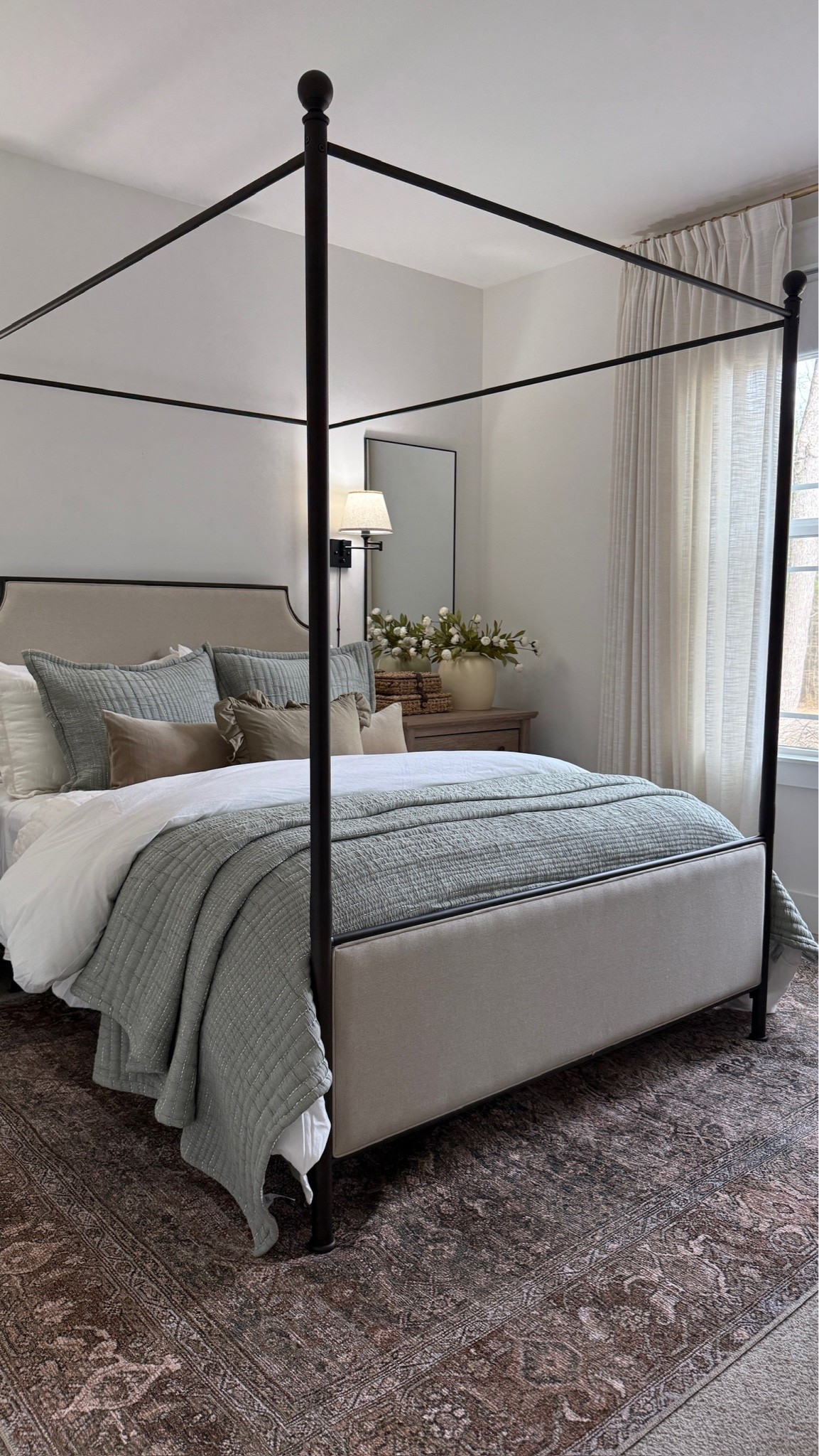 Cozy and calm guest bedroom! This room is layered, collected, and I love the soft neutrals of the bedding🤍 I love this canopy bed so much! 😍

#LTKHome
