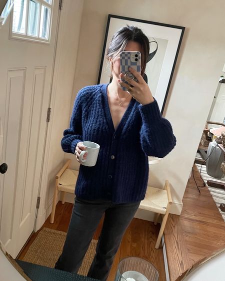 I have truly lived in this sweater nonstop since getting it. Comes in so many great colors, has the perfect cropped length and the neckline is just enough to show some skin while not having to worry I’m going to flash anybody (and yes yes yes safe to go bra-less!). The sleeve cuffs also add a nice polished look - I know I’m going to need more colors. HOT TAKE: I like this way more than my Jenni Kayne Cocoon Cardi. I said it and I meant it.

Cardi via Sezane. Size rec — go DOWN a size! The opposite of my usual rec but trust me! I’m in the XXS.

Jeans are J.crew and an incredible deal right now. I also went down a size to 24 in these — use code SHOPNOW for an extra 50% off!

#LTKMostLoved #LTKSeasonal #LTKstyletip