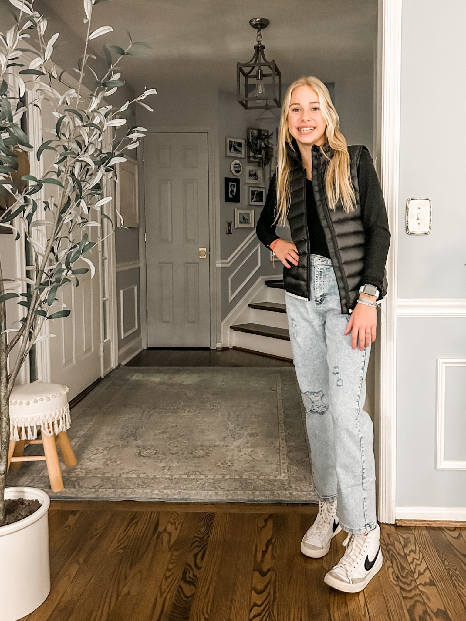 Teen girl jeans, high-rise light wash jeans for girls, teen girl outfit.
Vest is from Apricot Lane, linked similar.
Women’s Nike Blazers, Target jeans, long sleeve ribbed black top, teen girl jewelry, Apple Watch, monogram necklace, gold hoop earrings.

#LTKSeasonal #LTKkids #LTKunder50