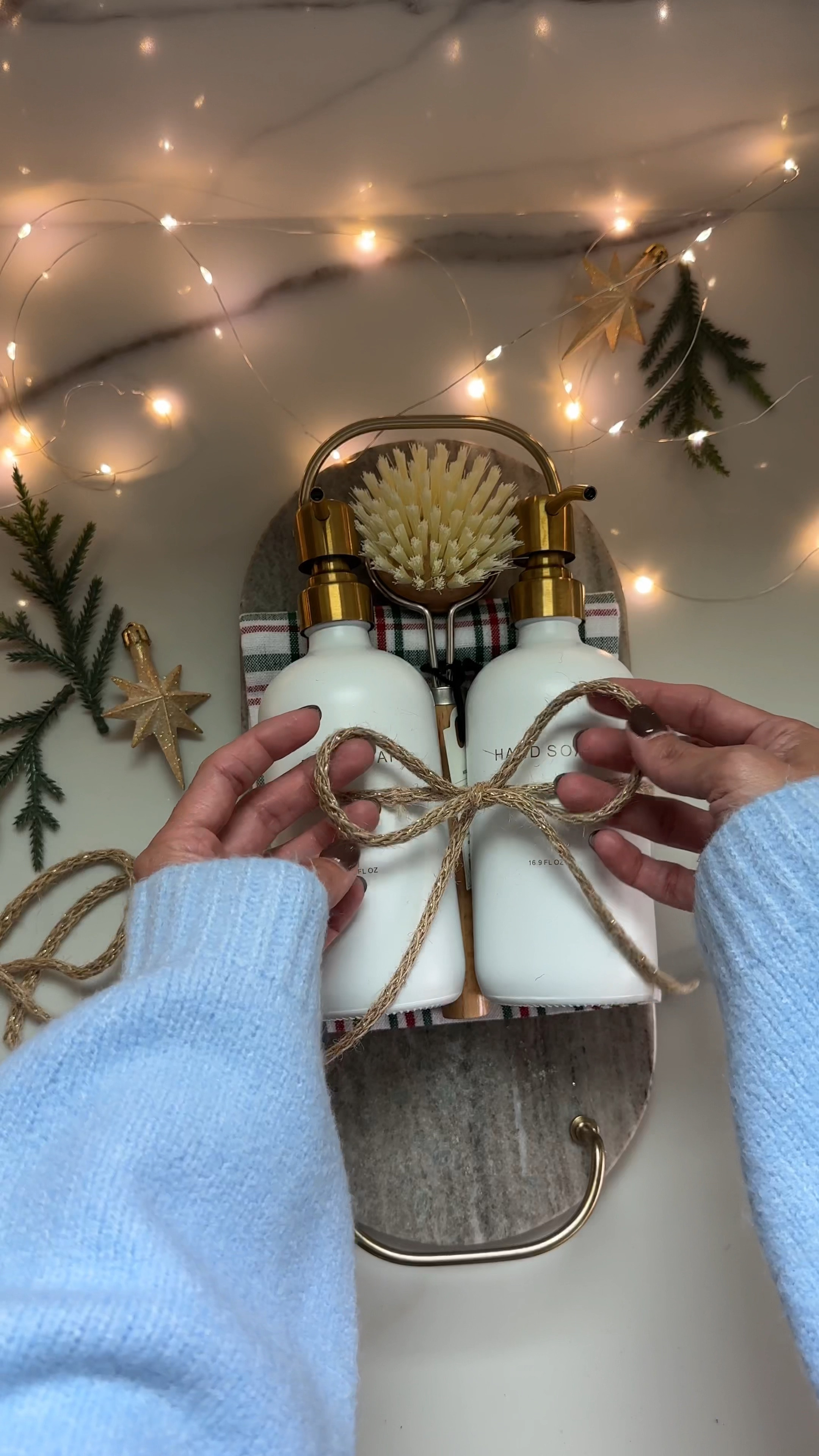 Super easy gift idea they will love!! This marble tray is so pretty with the gold handles, adding my absolute favorite Soap dispensers that have the label etched in the bottle, add a festive tea towel or kitchen towel, and a brush and you have a thoughtful gift they will actually use!! Best of all it’s all adorable 

#LTKHome #LTKWatchNow #LTKGiftGuide