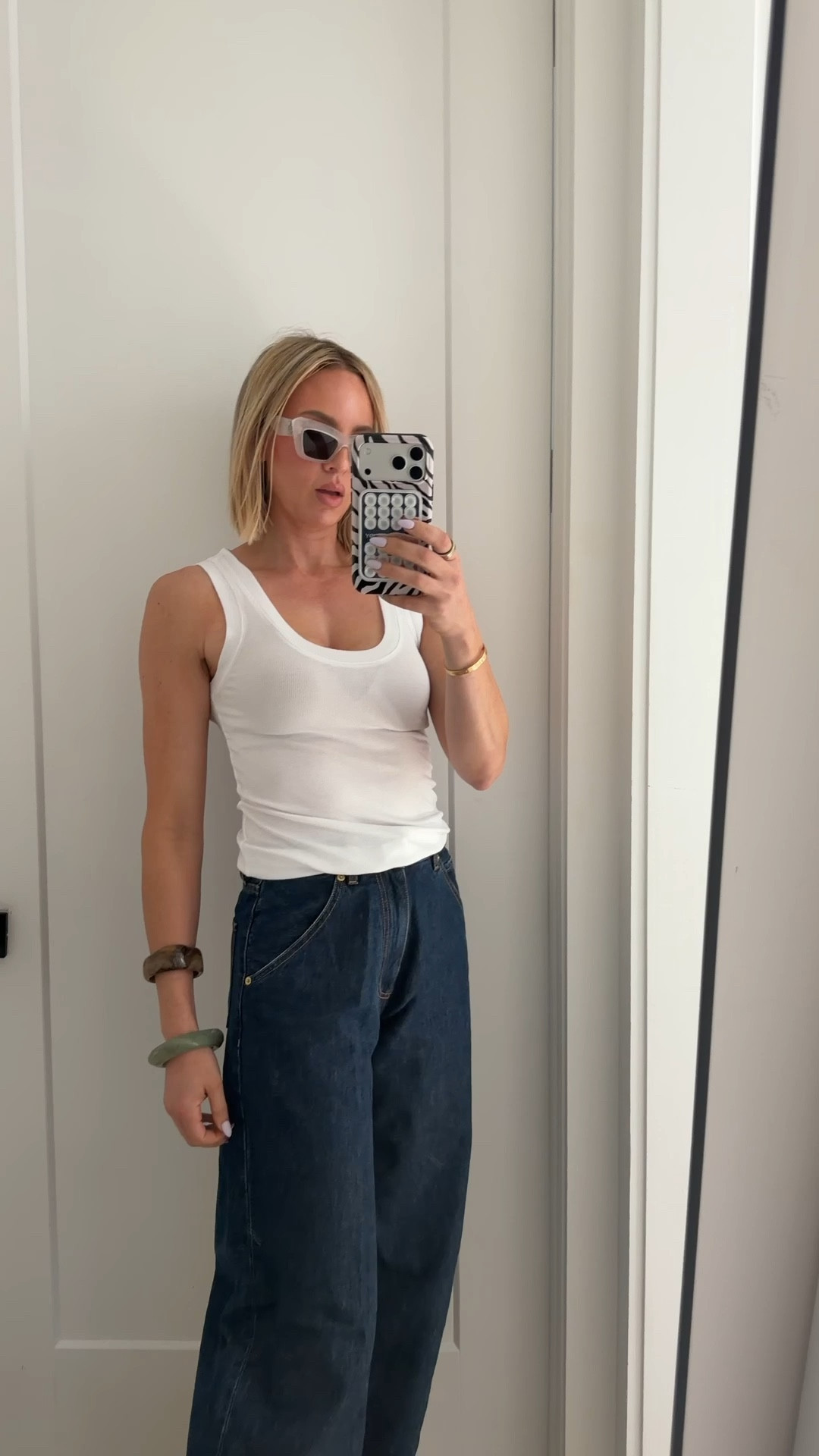 Wearing a small in the tank. Jeans run tts. Tall girl friendy

#LTKmomlife #LTKootd #LTKdayinmylife