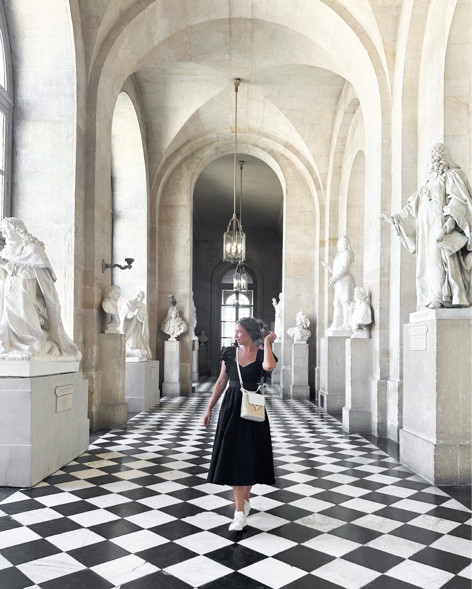 The cutest little black dress for summer! Loved the bow ties in the back! 

Black midi dress. Comfortable walking shoes. White sneakers. Crossbody. Amazon fashion. Ruffled dress. Midi dress. Travel inspiration. Paris outfit. Paris fashion. European summer ootd. LBD. 

#LTKtravel #LTKeurope #LTKunder100