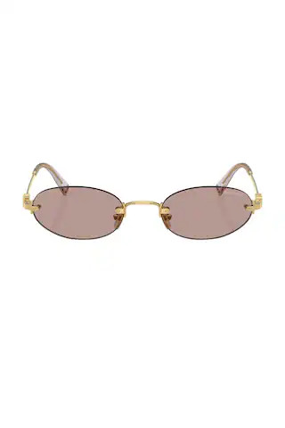 Miu Miu Oval Sunglasses in Metallic Gold | FWRD 