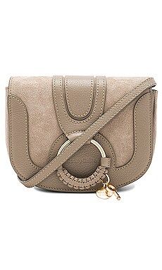 See By Chloe Hana Mini Crossbody Bag in Motty Grey from Revolve.com | Revolve Clothing (Global)