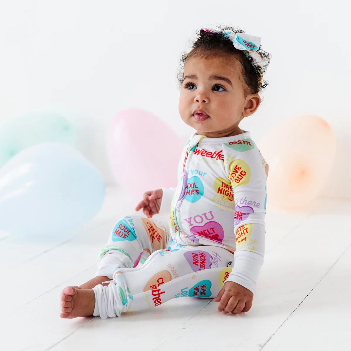 Sweethearts® Colorful Candy Hearts Convertible Romper | Bums & Roses