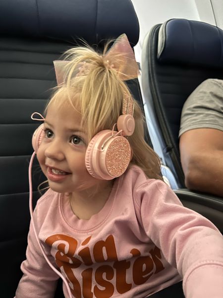 Amazon headphones with bow and crown 🎀 $20 on Amazon 📦

Linked her big sis sweatshirt from Etsy too!

#LTKbaby #LTKkids #LTKtravel