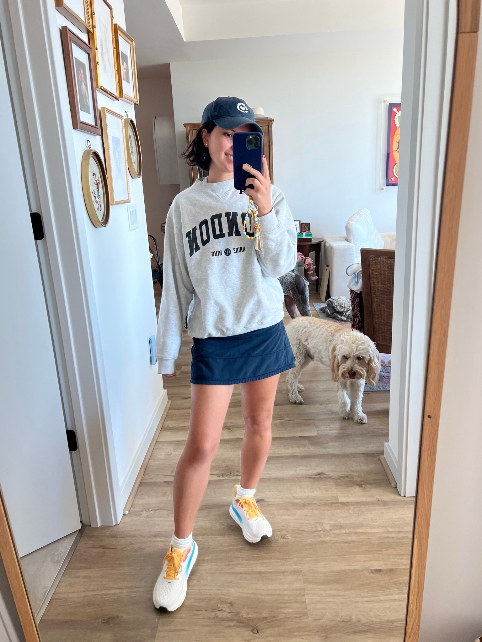 Hoka sneakers, tennis skort, tennis skirt, pickle ball, pickleball, anine bing sweatshirt, baseball hat outfit, lululemon skirt, grey sweatshirt 

#LTKShoeCrush #LTKActive